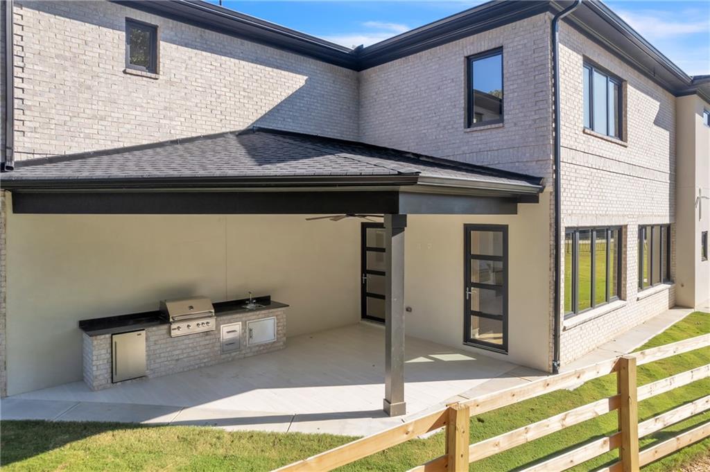 1939 Sunny Hill Road Lawrenceville, GA 30043 - Photo 4 of 47 a view of a house with sitting area