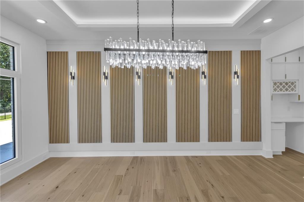 1939 Sunny Hill Road Lawrenceville, GA 30043 - Photo 7 of 47 a view of a chandelier in a room and window