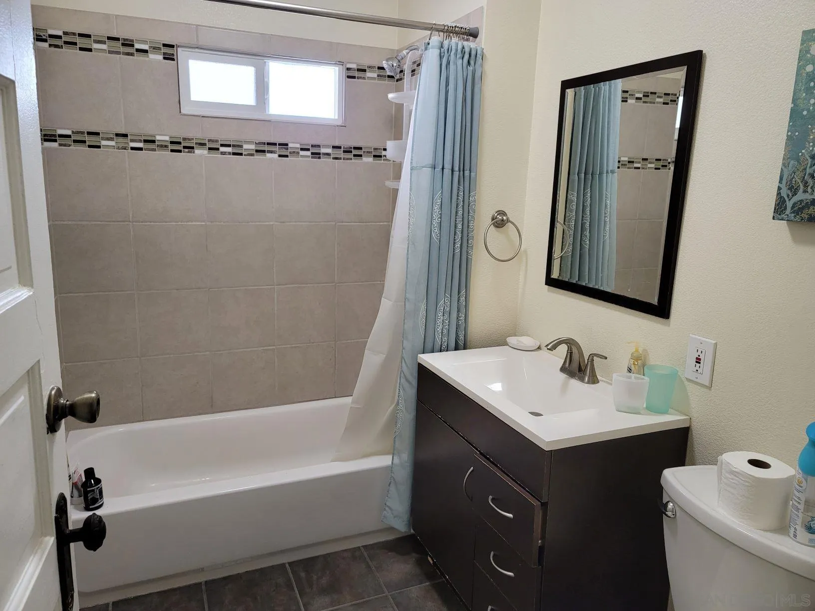 3967-69 8th Avenue San Diego, CA 92103 - Photo 5 of 10 a bathroom with a tub sink and mirror