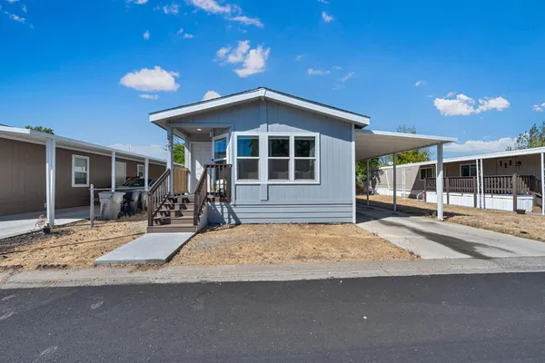 a view of a house with a patio
