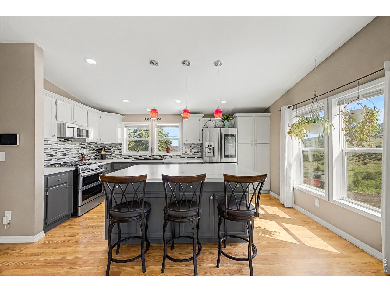 14500 Buckhorn Road Loveland, CO 80538 - Photo 3 of 34 Recently renovated kitchen includes a large kitchen island
