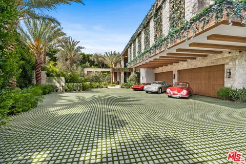 a view of a street with cars