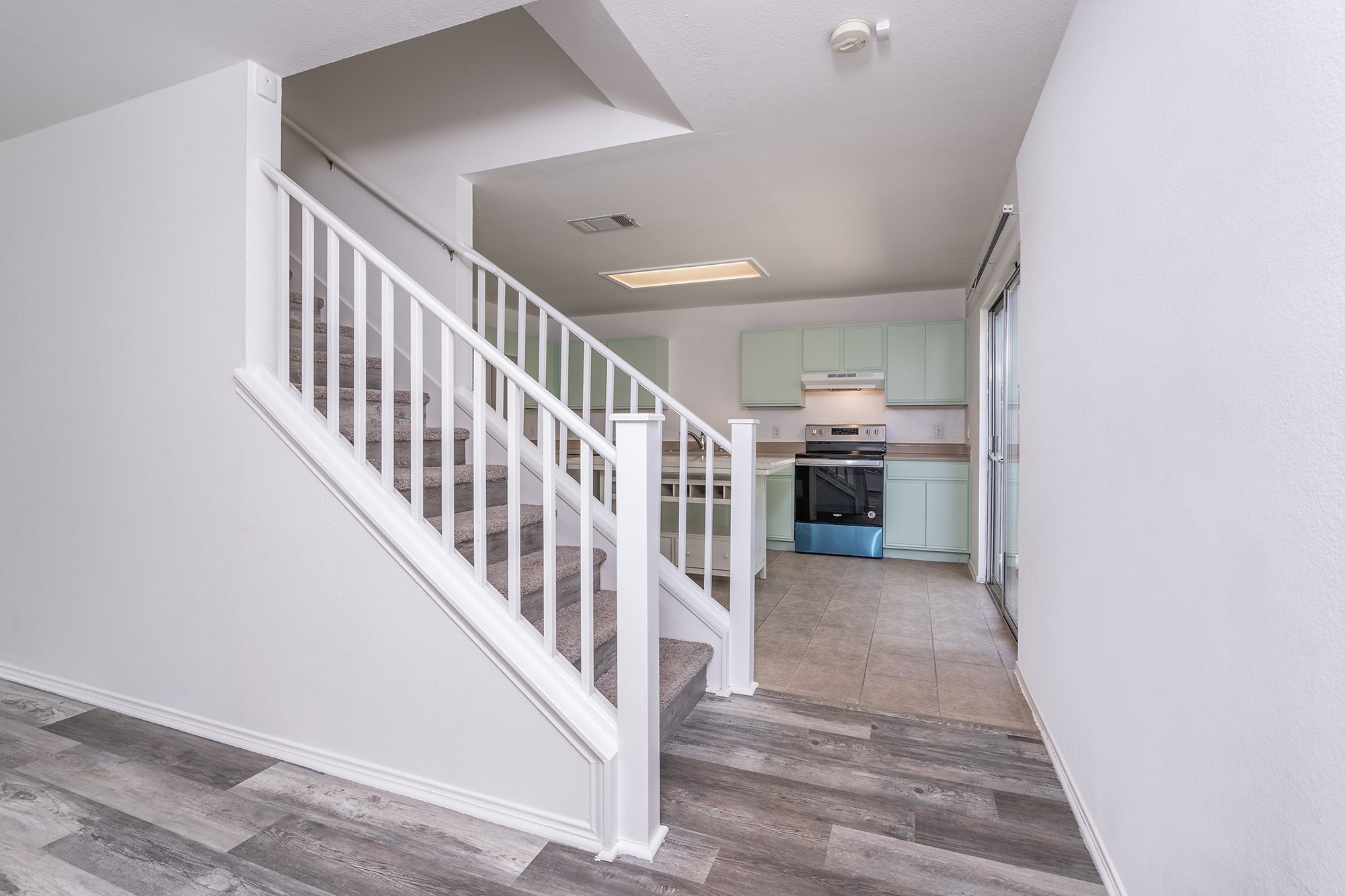 1305 Water Spaniel Way Round Rock, TX 78664 - Photo 15 of 27 a view of entryway and hall with wooden floor