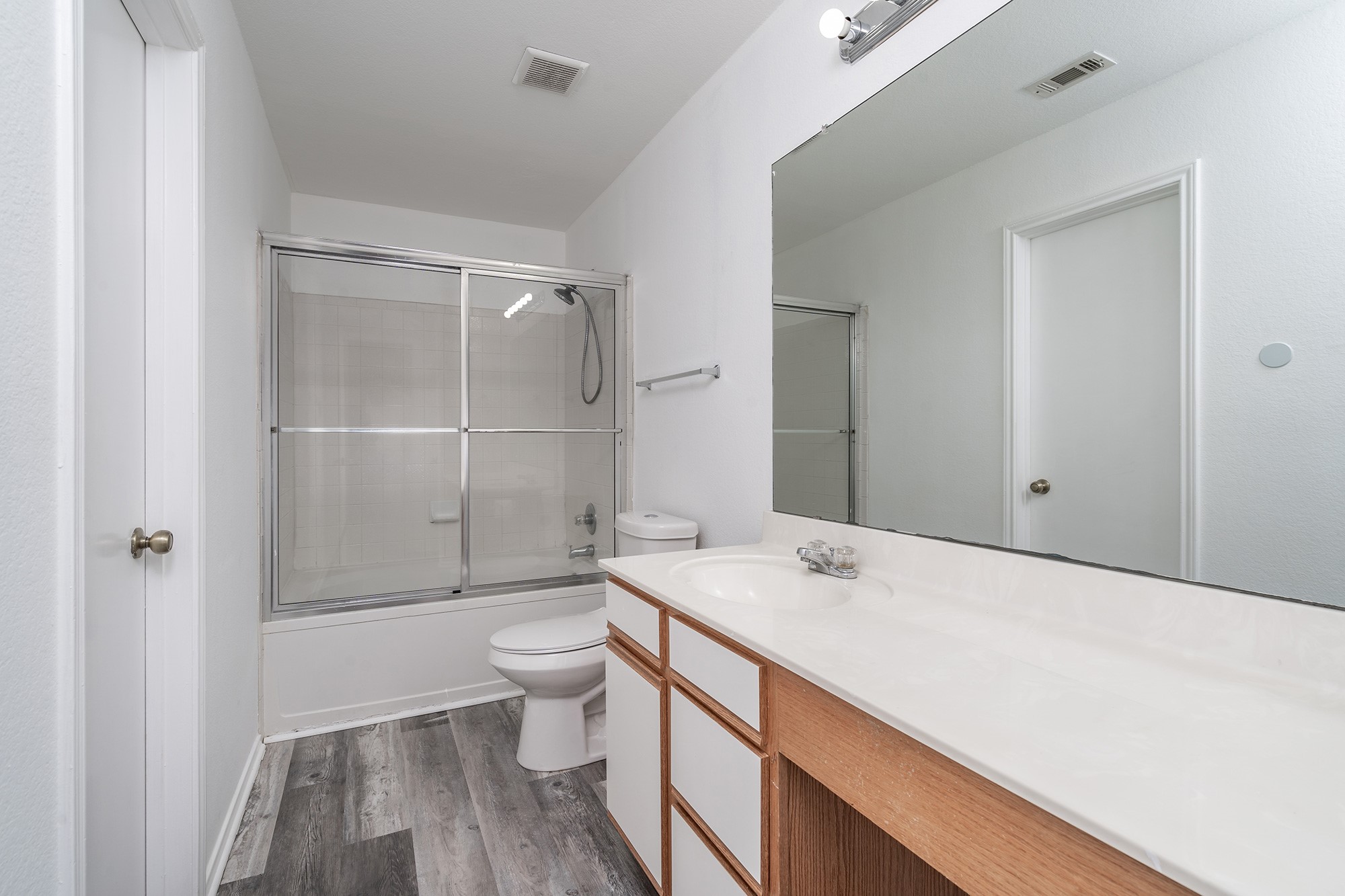 1305 Water Spaniel Way Round Rock, TX 78664 - Photo 18 of 27 a bathroom with a sink a toilet and shower
