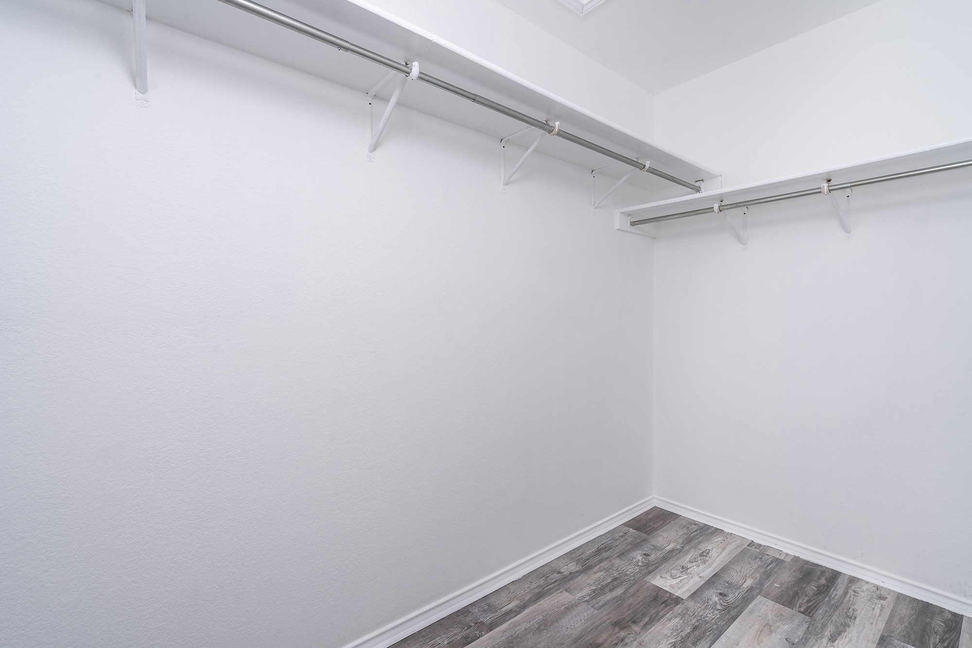 1305 Water Spaniel Way Round Rock, TX 78664 - Photo 19 of 27 a view of a room with racks on the wall