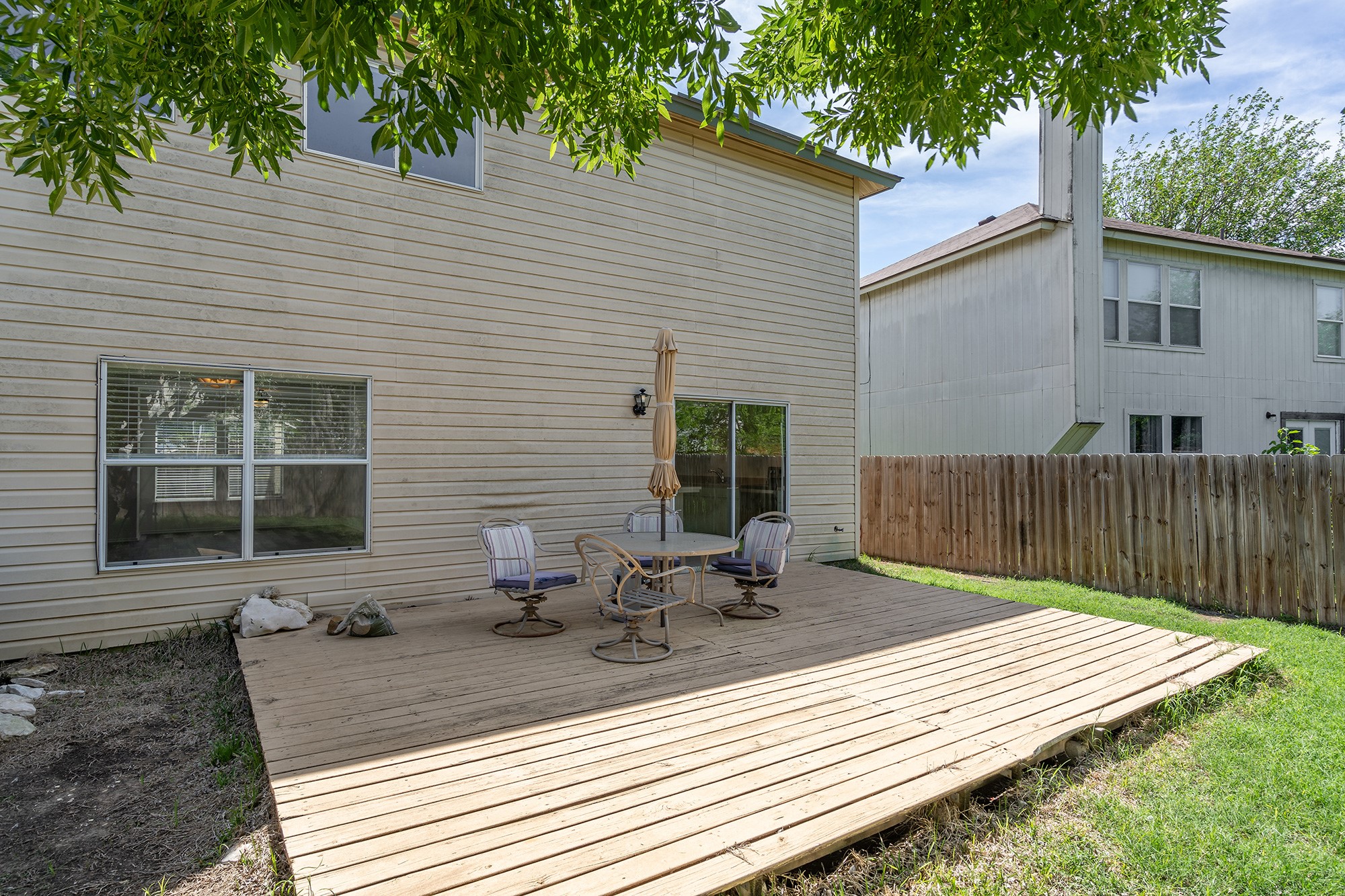 1305 Water Spaniel Way Round Rock, TX 78664 - Photo 24 of 27 a view of house with a chairs on the deck