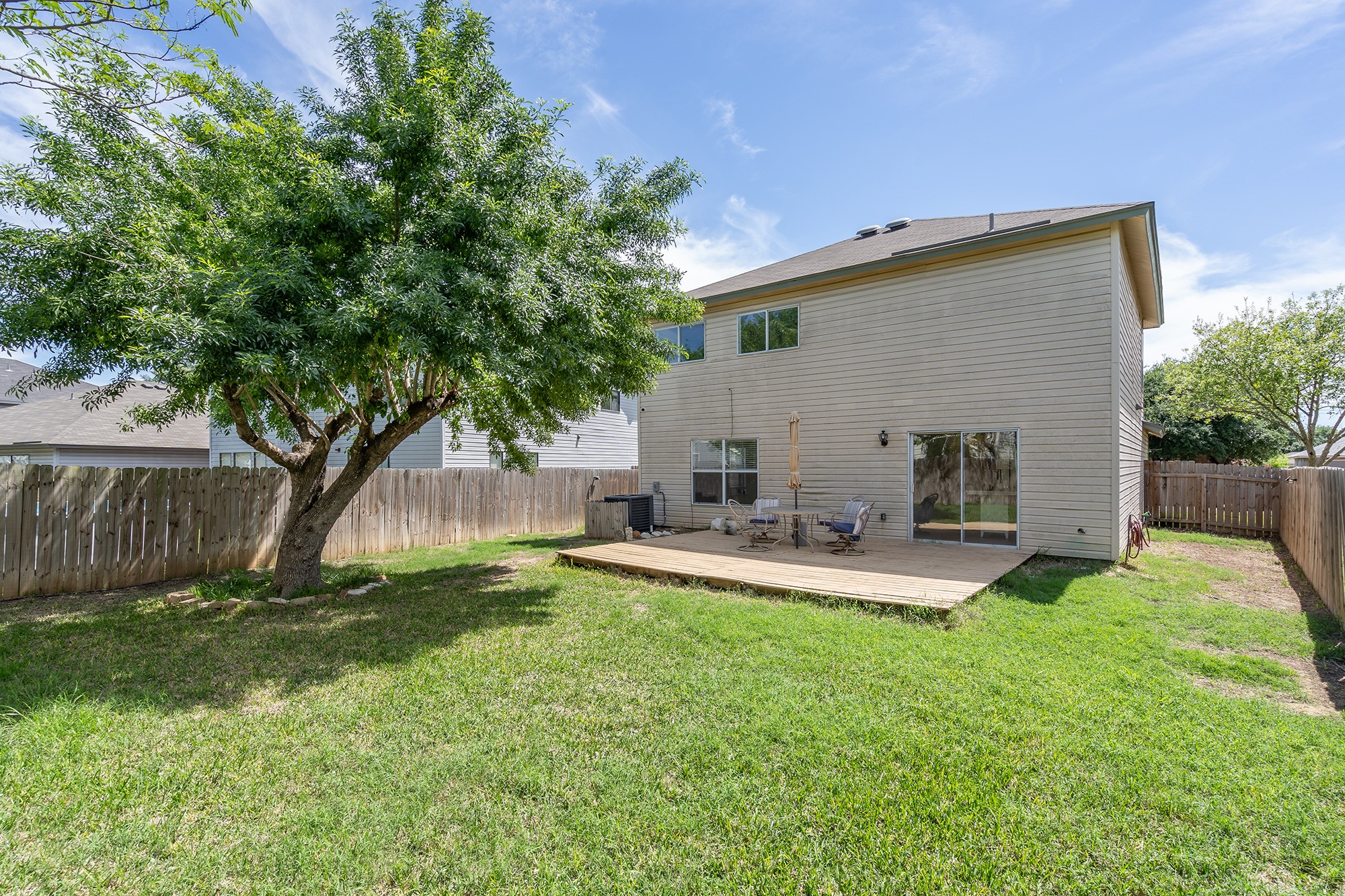 1305 Water Spaniel Way Round Rock, TX 78664 - Photo 26 of 27 a view of a house with backyard and sitting area