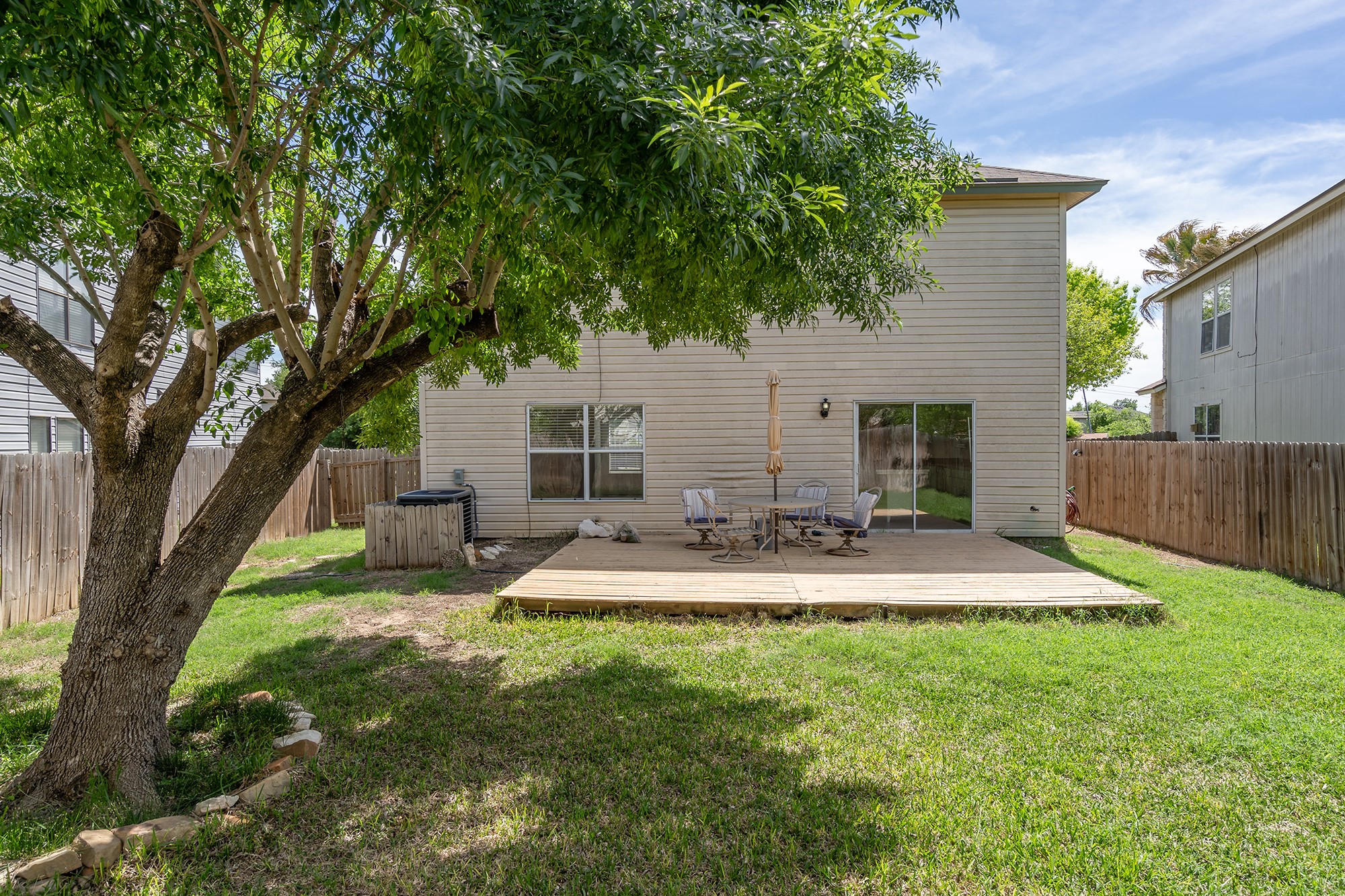 1305 Water Spaniel Way Round Rock, TX 78664 - Photo 27 of 27 a view of a house with a patio and a yard