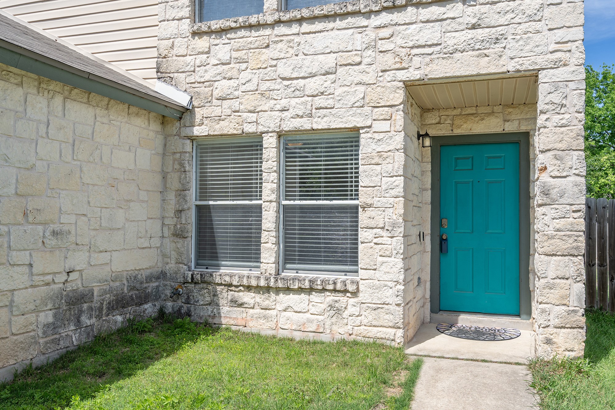 1305 Water Spaniel Way Round Rock, TX 78664 - Photo 4 of 27 a front view of a house with a yard