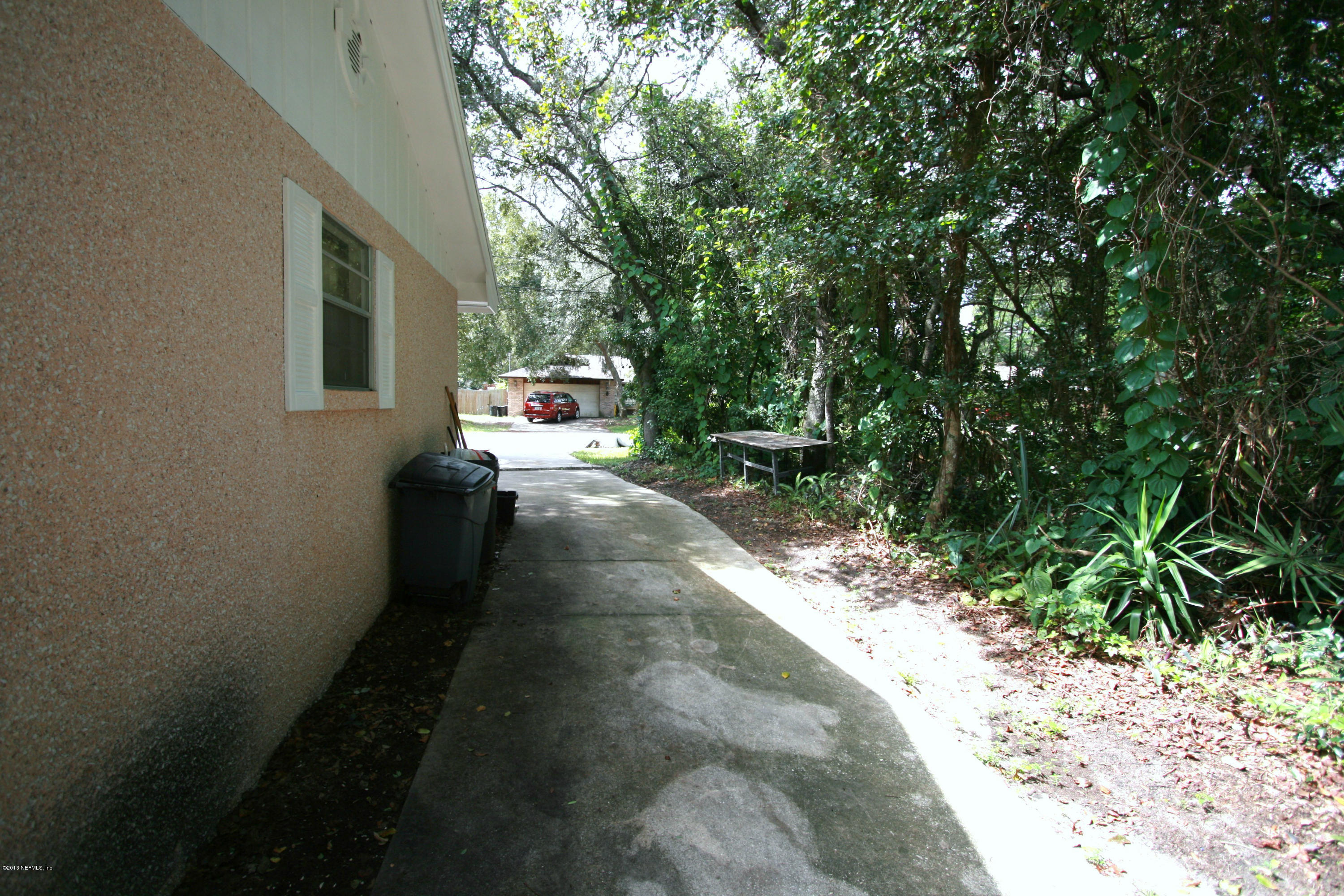 523 Gentian Road St. Augustine, FL 32086 - Photo 19 of 26 a view of a pathway with a yard