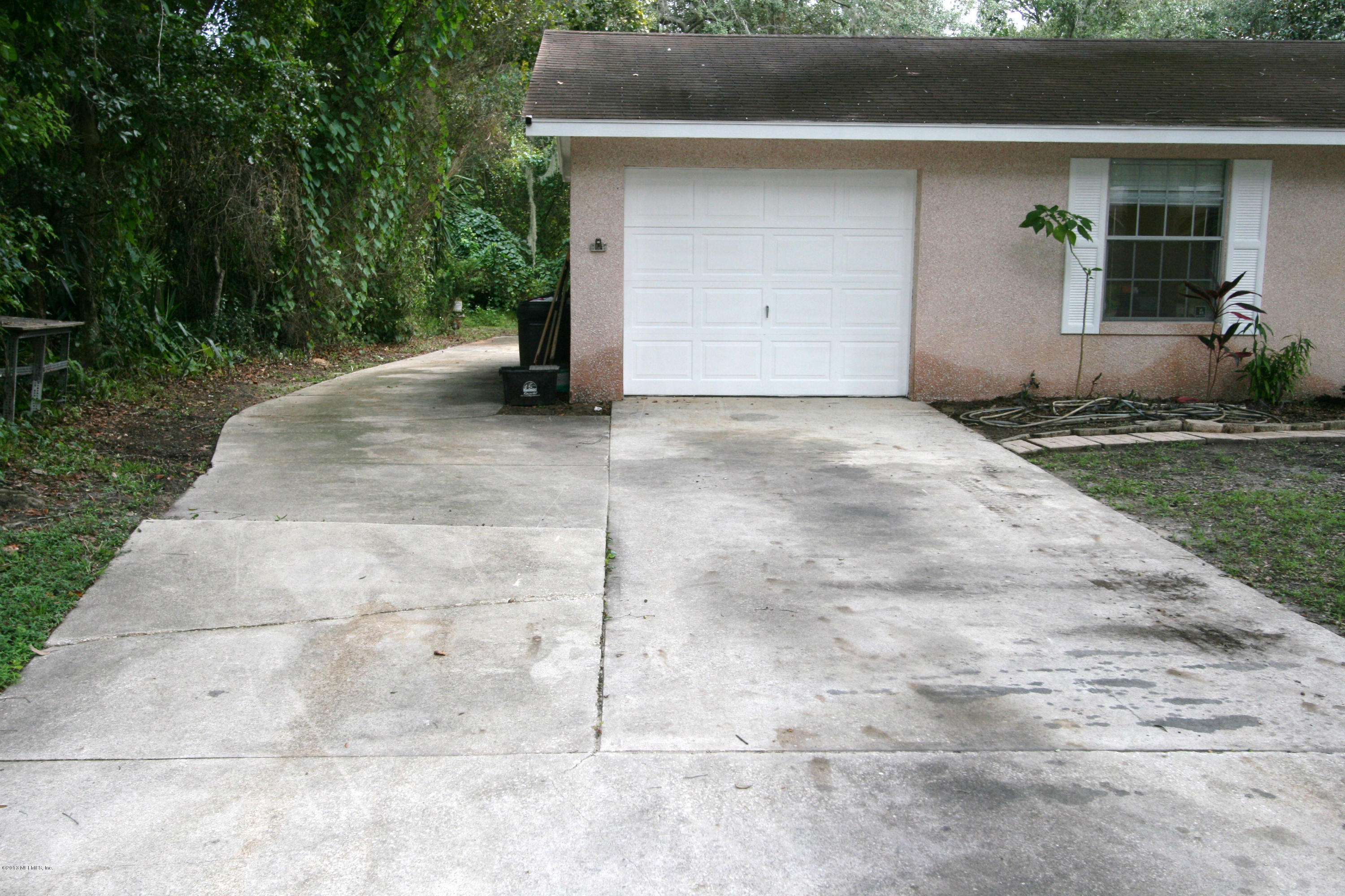 523 Gentian Road St. Augustine, FL 32086 - Photo 25 of 26 a view of a back yard of the house