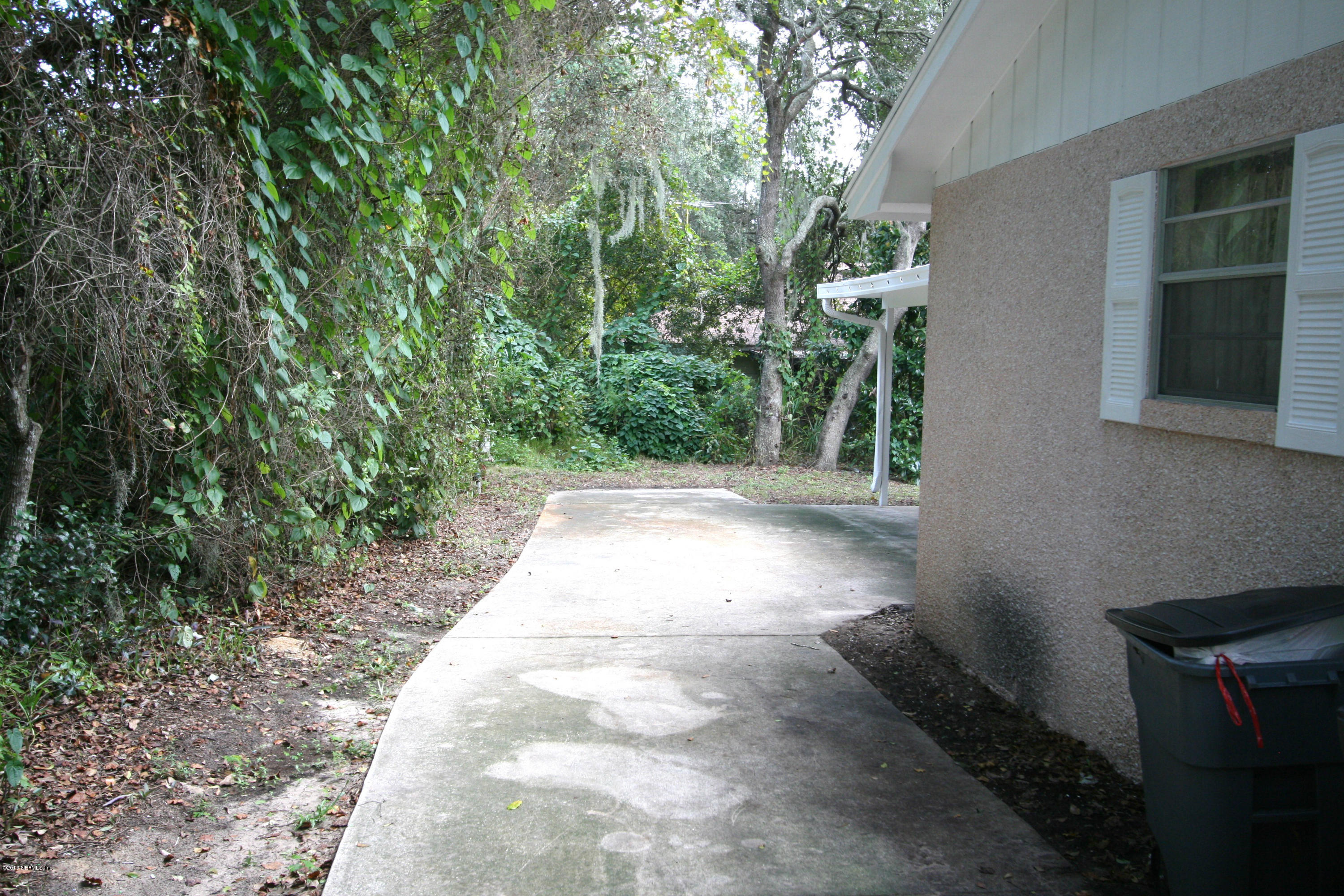 523 Gentian Road St. Augustine, FL 32086 - Photo 26 of 26 a view of a pathway with a yard
