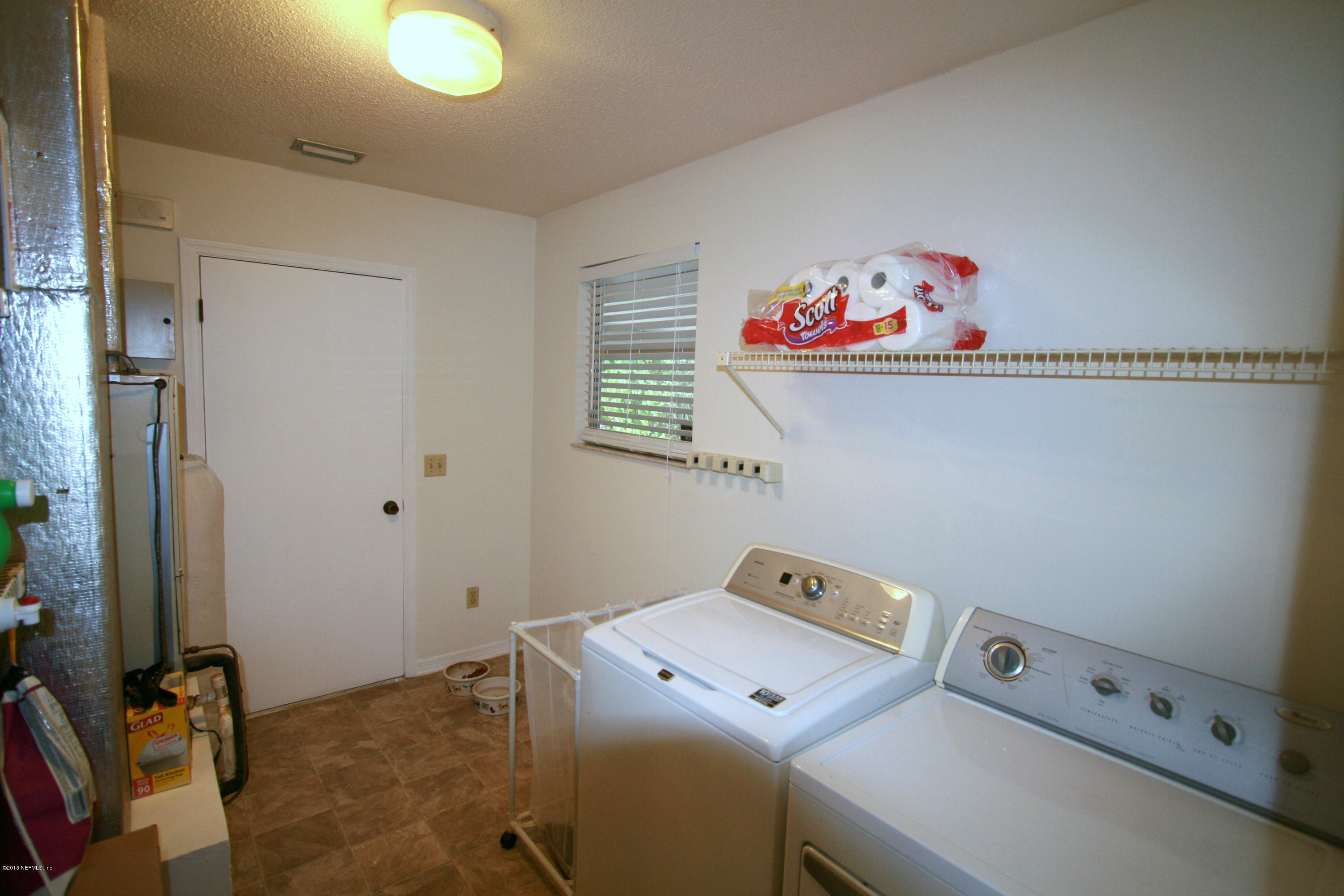 523 Gentian Road St. Augustine, FL 32086 - Photo 10 of 26 a utility room with dryer and washer