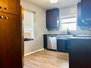 913 Lobster Lane Key Largo, FL 33037 - Photo 16 of 20 a view of a kitchen with a sink and dishwasher a refrigerator freezer