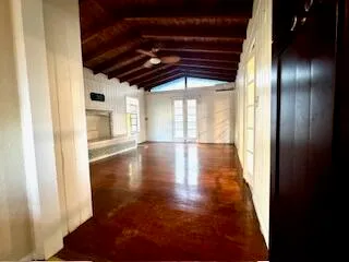 a view of gallery with wooden floor