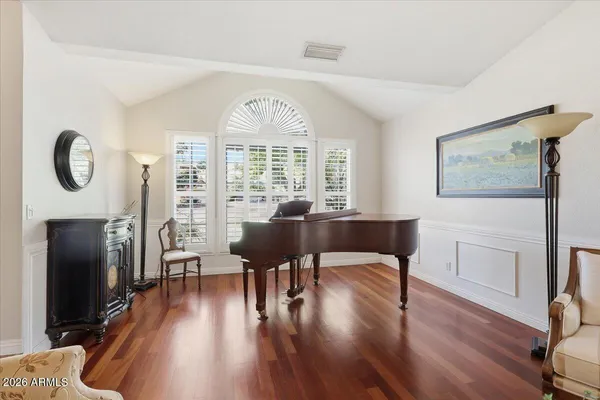 a kitchen with a sink cabinets and stainless steel appliances