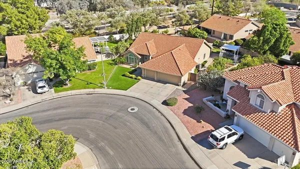 an aerial view of a house with a garden