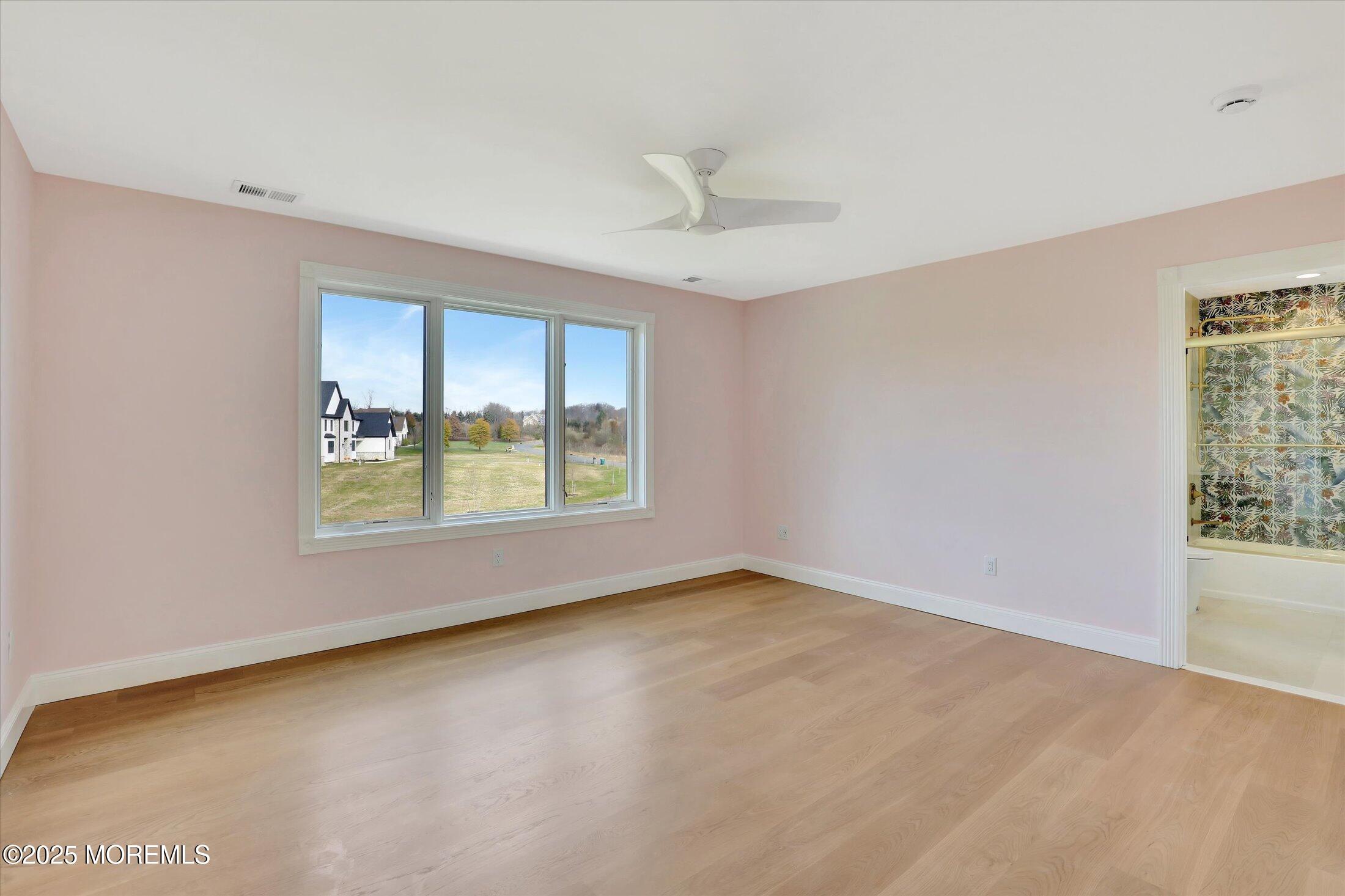 12 Cook Court Millstone Township, NJ 08535 - Photo 18 of 54 an empty room with a window