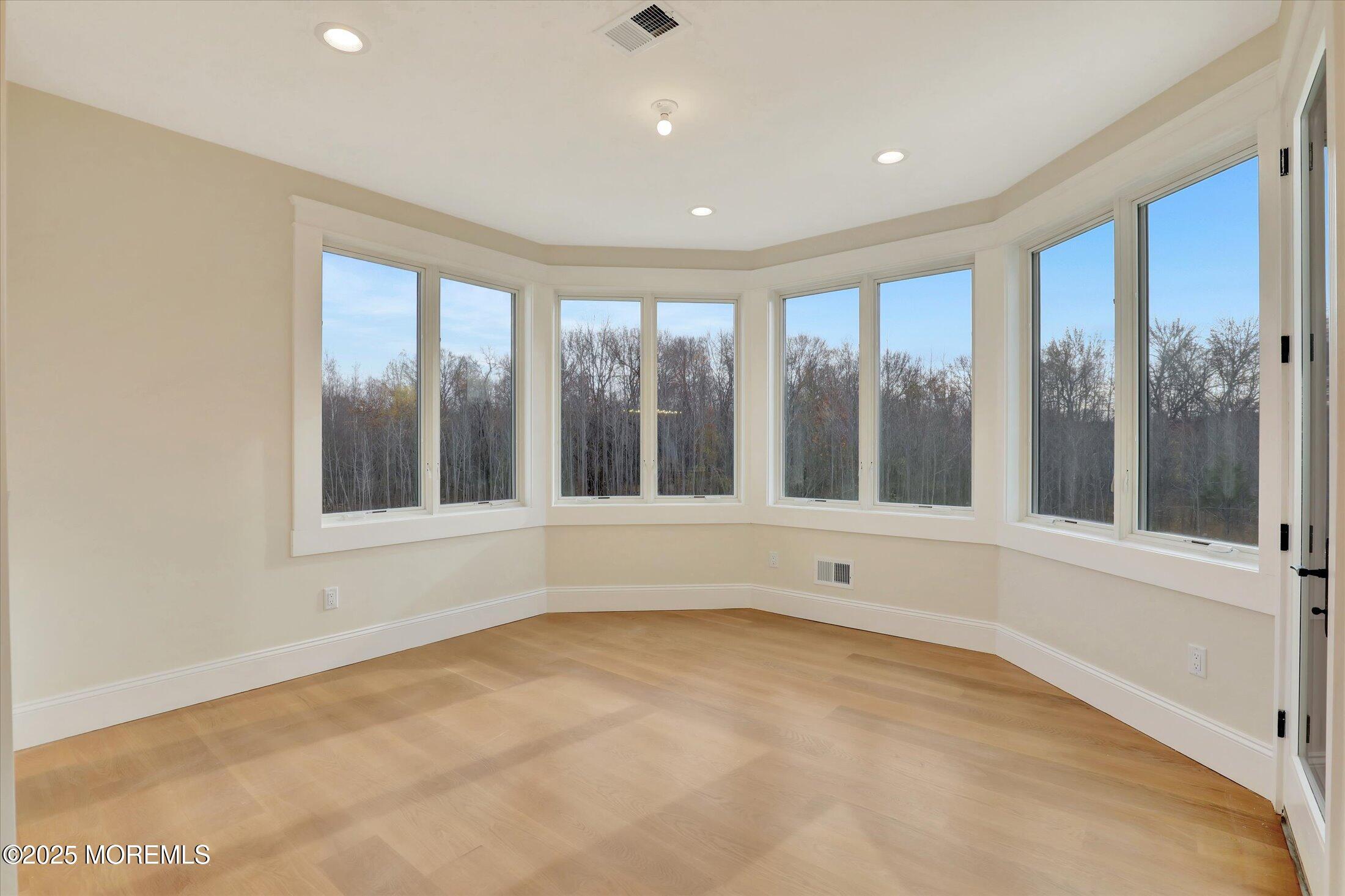 12 Cook Court Millstone Township, NJ 08535 - Photo 28 of 54 a view of an empty room with a window