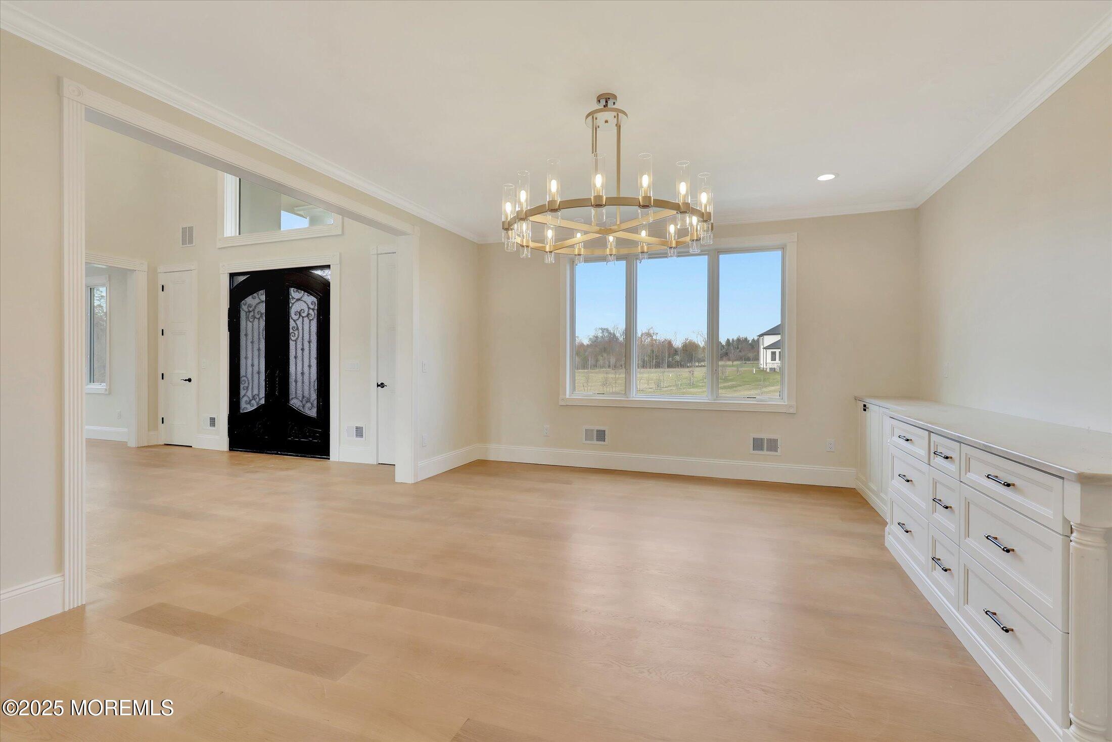 12 Cook Court Millstone Township, NJ 08535 - Photo 31 of 54 a view of an empty room with a window