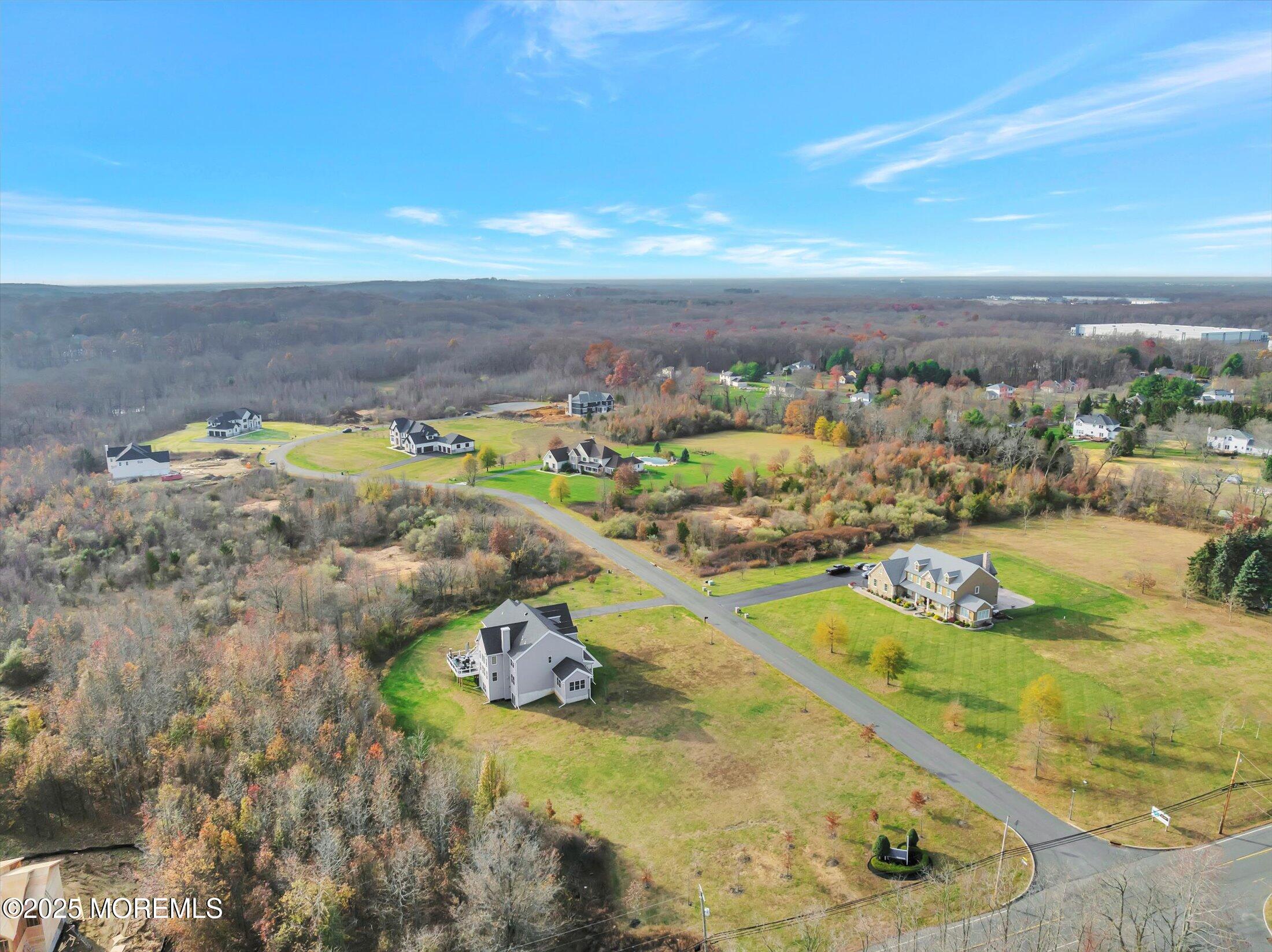 12 Cook Court Millstone Township, NJ 08535 - Photo 48 of 54 a view of a swimming pool with an ocean view