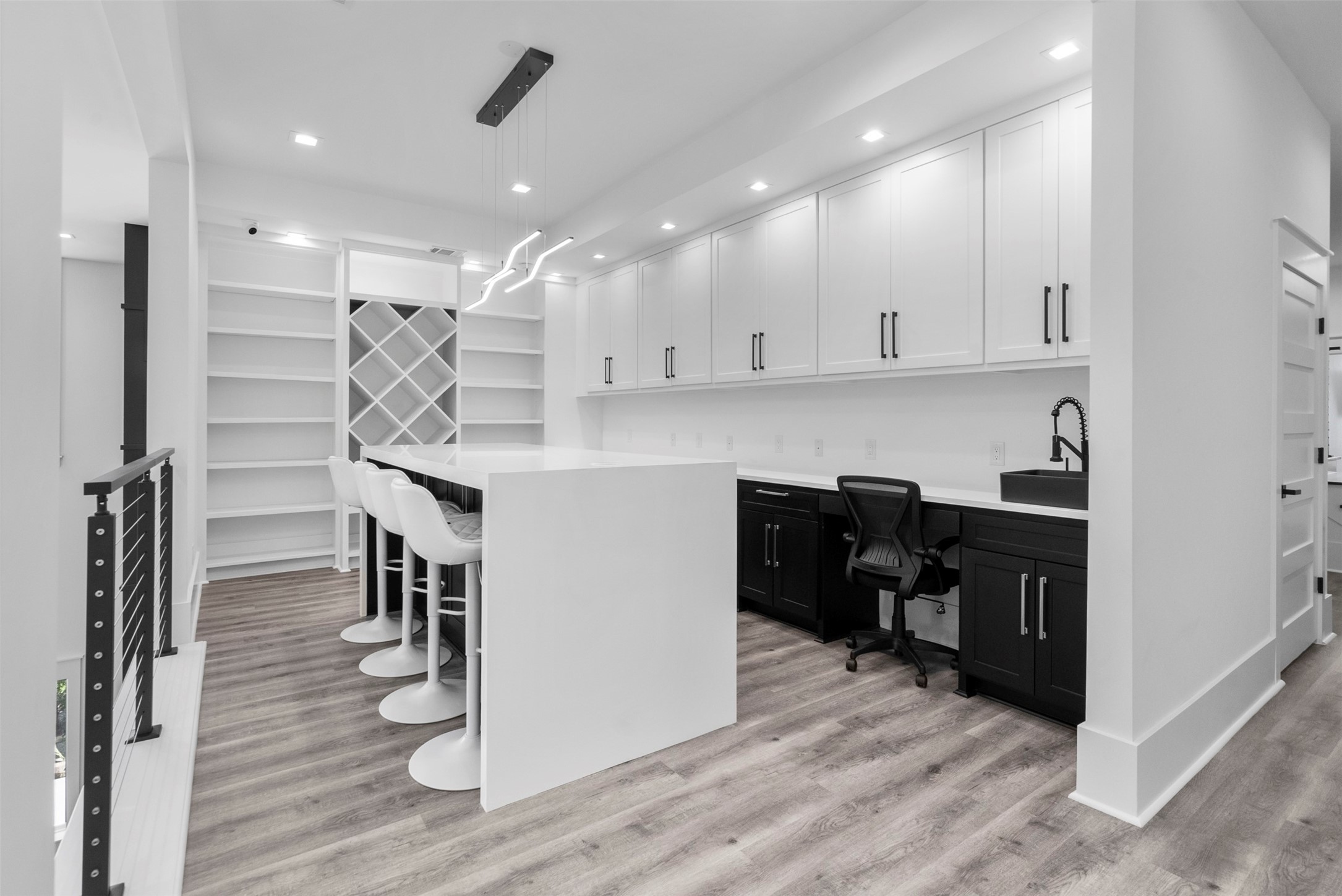 12 County Road 3558 Cleveland, TX 77327 - Photo 22 of 50 Conference area complete with plenty of cabinets and shelving, wireless charging ports, WiFi ports, all while featuring quartz countertops.