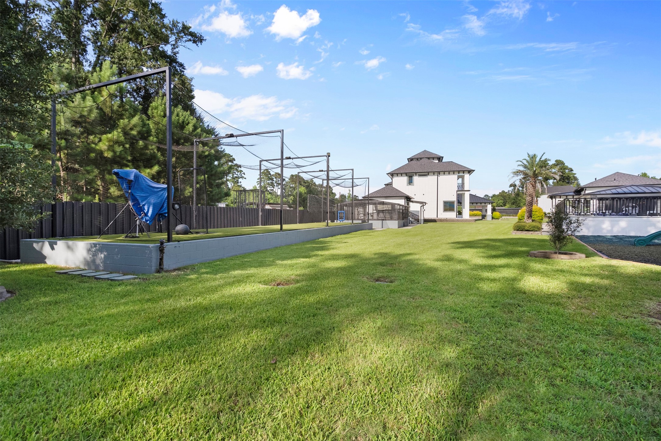 12 County Road 3558 Cleveland, TX 77327 - Photo 41 of 50 Batting cages ready for your enjoyment