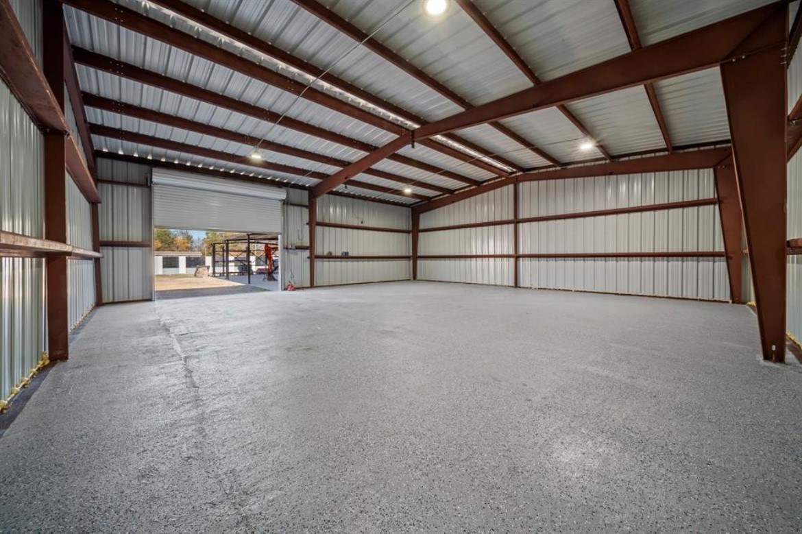 12 County Road 3558 Cleveland, TX 77327 - Photo 49 of 50 2nd warehouse 40x40 with custom built in racks