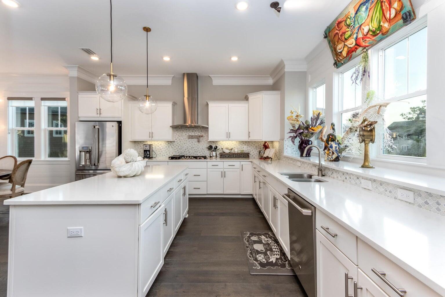 4 Clipper Street, Unit 1 Inlet Beach, FL 32461 - Photo 14 of 32 a large kitchen with stainless steel appliances lots of counter space sink and a window