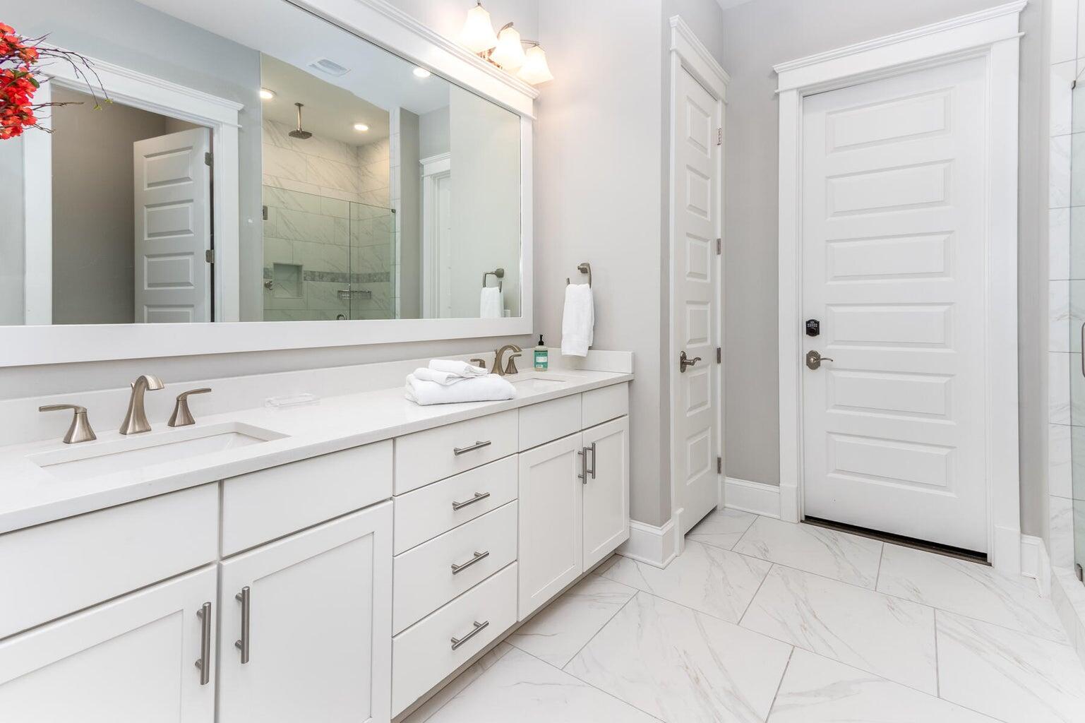 4 Clipper Street, Unit 1 Inlet Beach, FL 32461 - Photo 17 of 32 a bathroom with a granite countertop sink mirror and