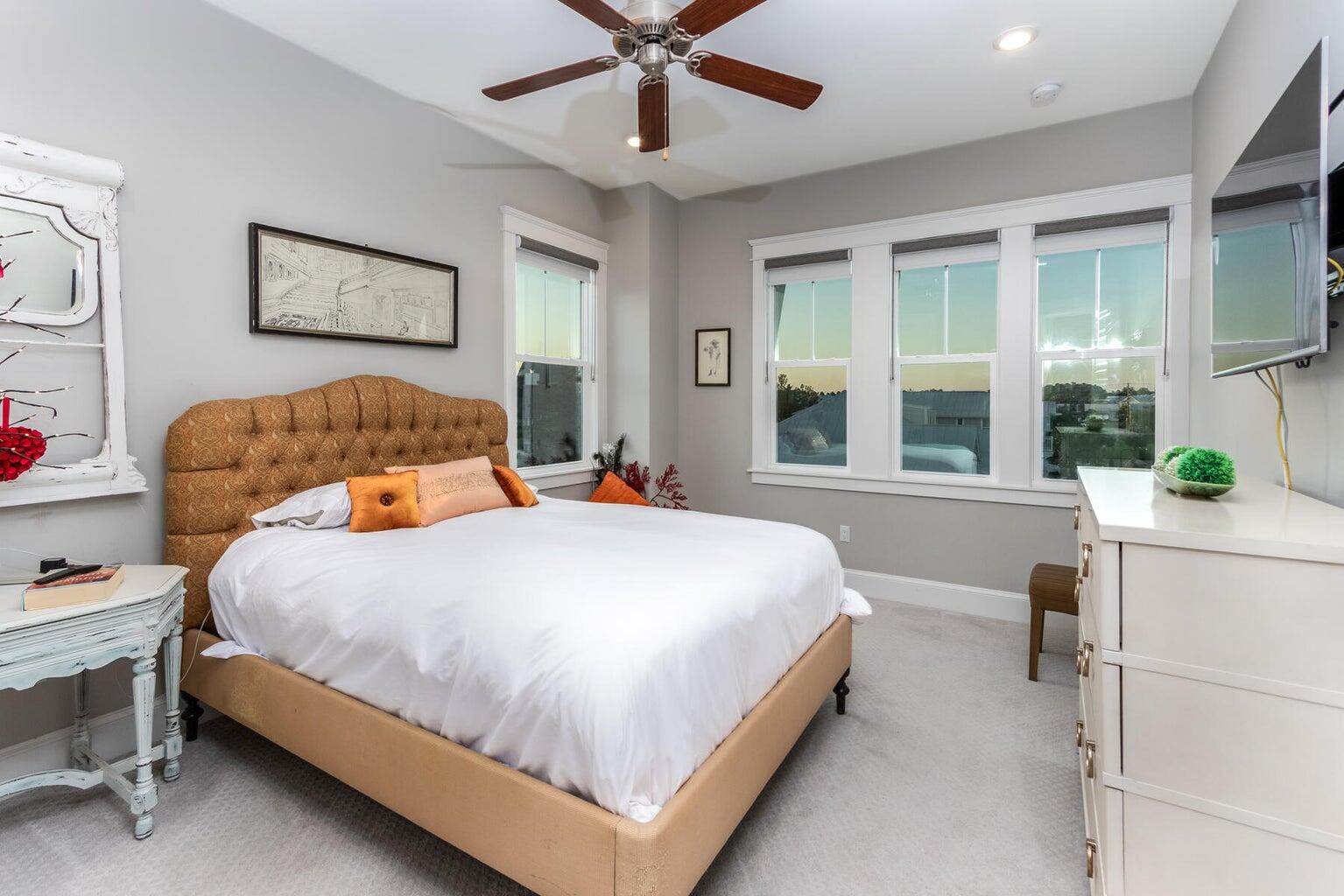 4 Clipper Street, Unit 1 Inlet Beach, FL 32461 - Photo 20 of 32 a bedroom with a bed and a large window