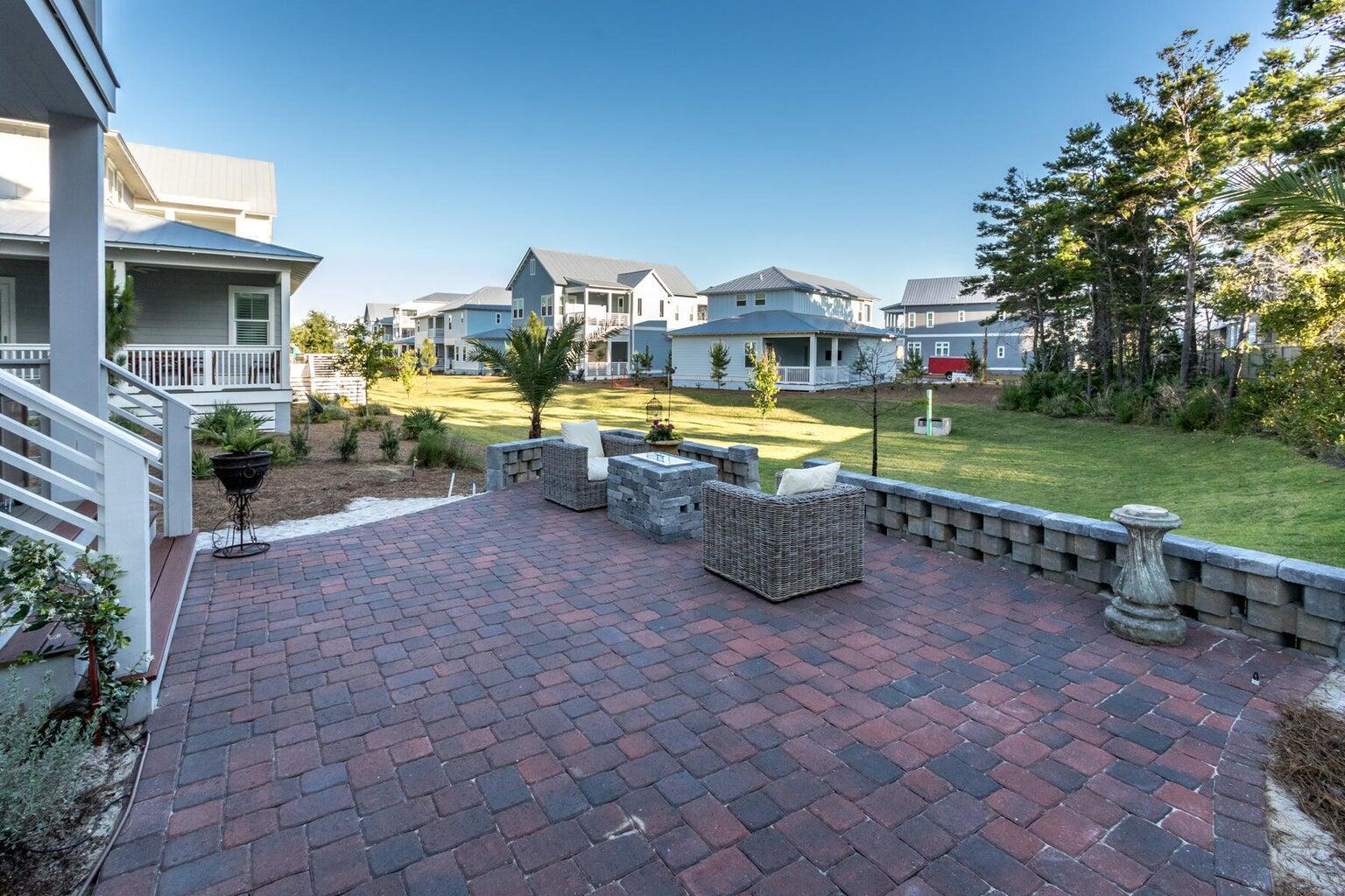 4 Clipper Street, Unit 1 Inlet Beach, FL 32461 - Photo 29 of 32 a swimming pool with outdoor seating and yard