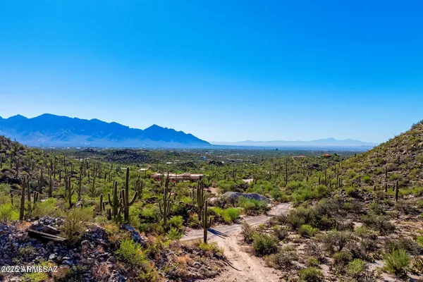 a view of a city with mountains in the background