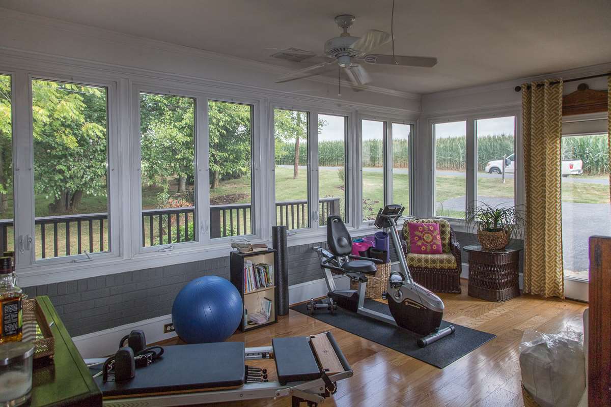 5720 Battlefield Road Harrisonburg, VA 22801 - Photo 12 of 41 a room with furniture and a floor to ceiling window