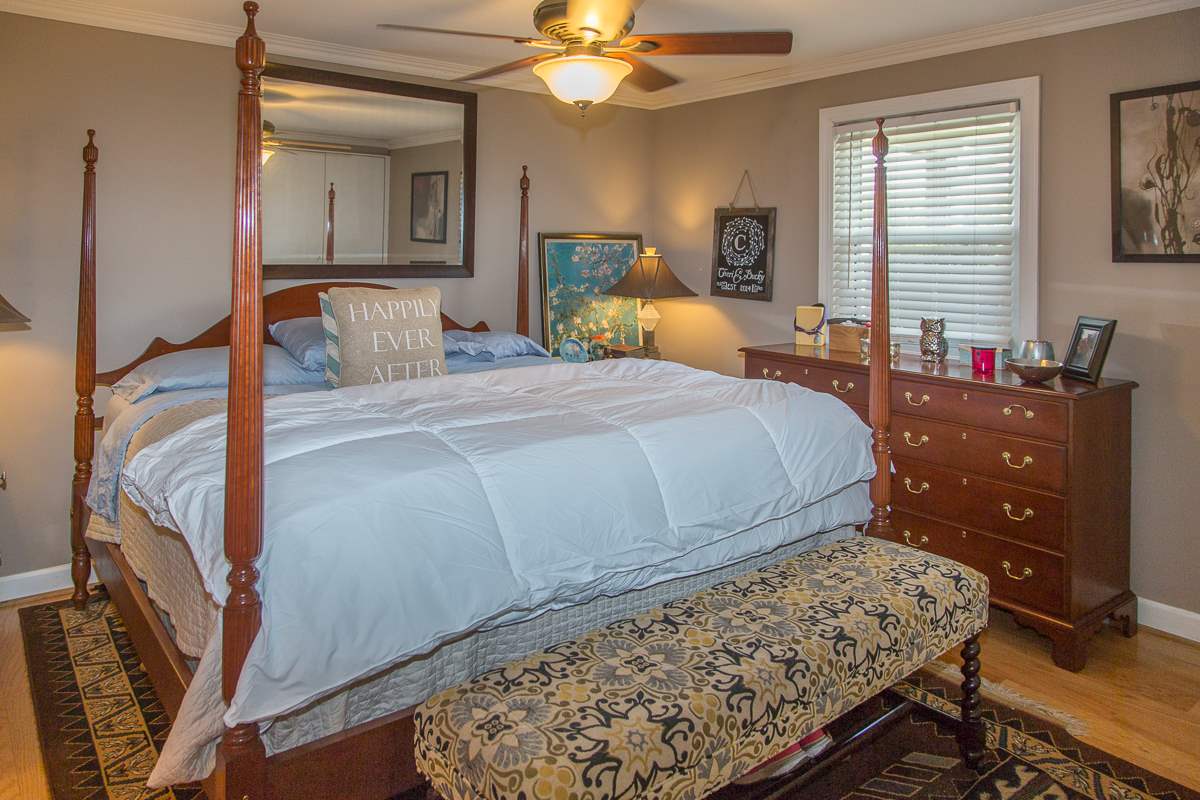 5720 Battlefield Road Harrisonburg, VA 22801 - Photo 16 of 41 a bedroom with a bed and a dresser