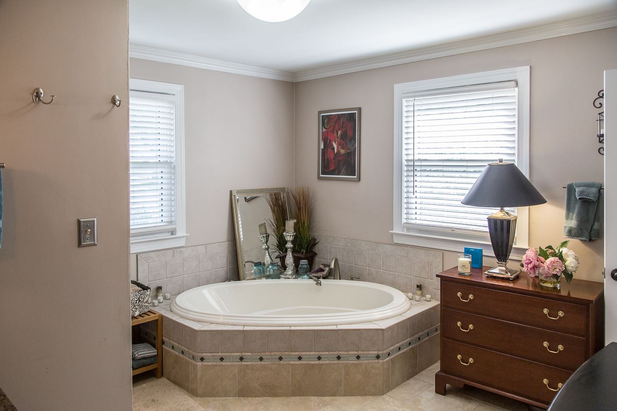 5720 Battlefield Road Harrisonburg, VA 22801 - Photo 17 of 41 a bathroom with a sink and a mirror