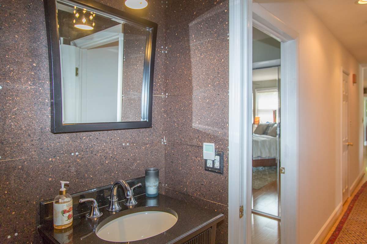 5720 Battlefield Road Harrisonburg, VA 22801 - Photo 24 of 41 a bathroom with a sink and a mirror