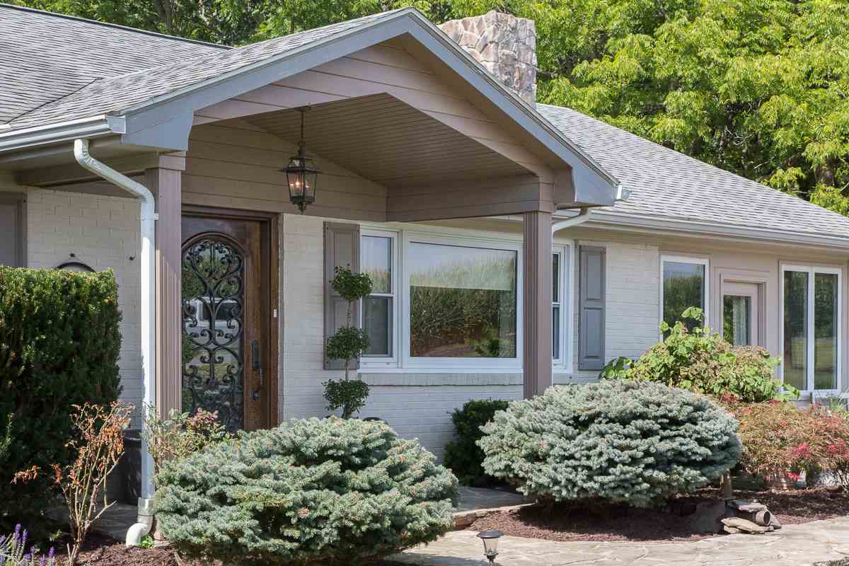 5720 Battlefield Road Harrisonburg, VA 22801 - Photo 36 of 41 front view of a house with potted plants