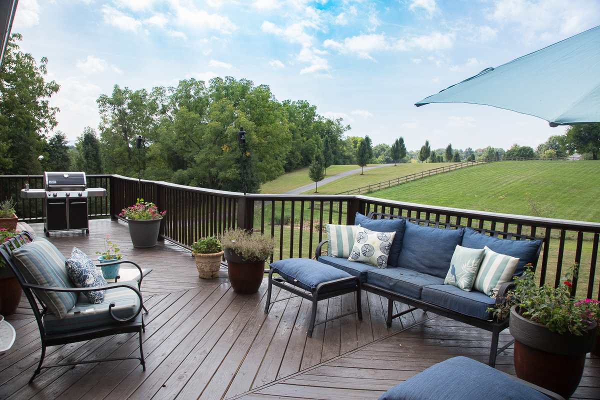 5720 Battlefield Road Harrisonburg, VA 22801 - Photo 37 of 41 a view of a patio with couches chairs and wooden floor