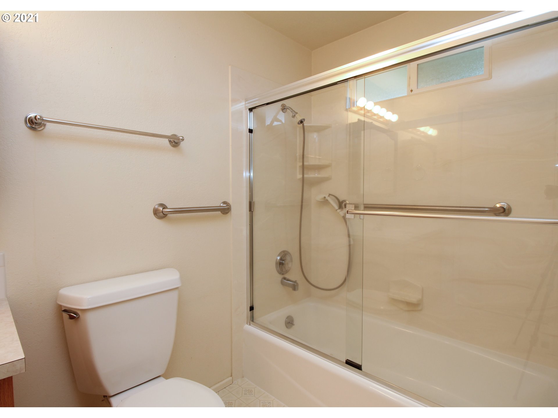 6988 B Street Springfield, OR 97478 - Photo 21 of 31 a bathroom with a shower and a toilet