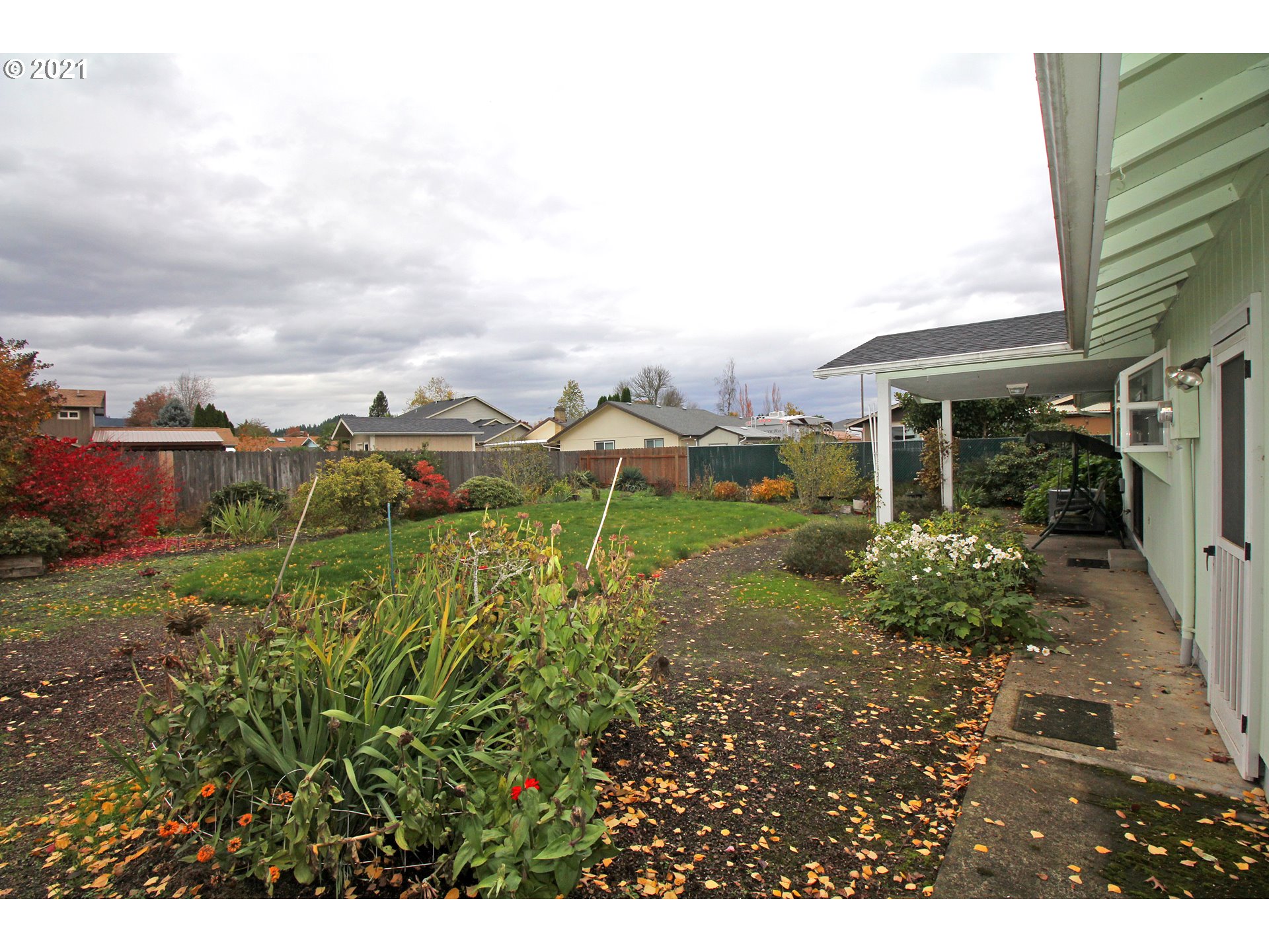 6988 B Street Springfield, OR 97478 - Photo 25 of 31 a view of a house with a garden