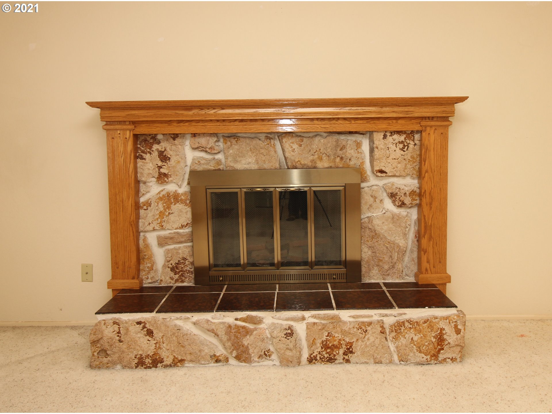 6988 B Street Springfield, OR 97478 - Photo 6 of 31 a black and white photo of a fireplace