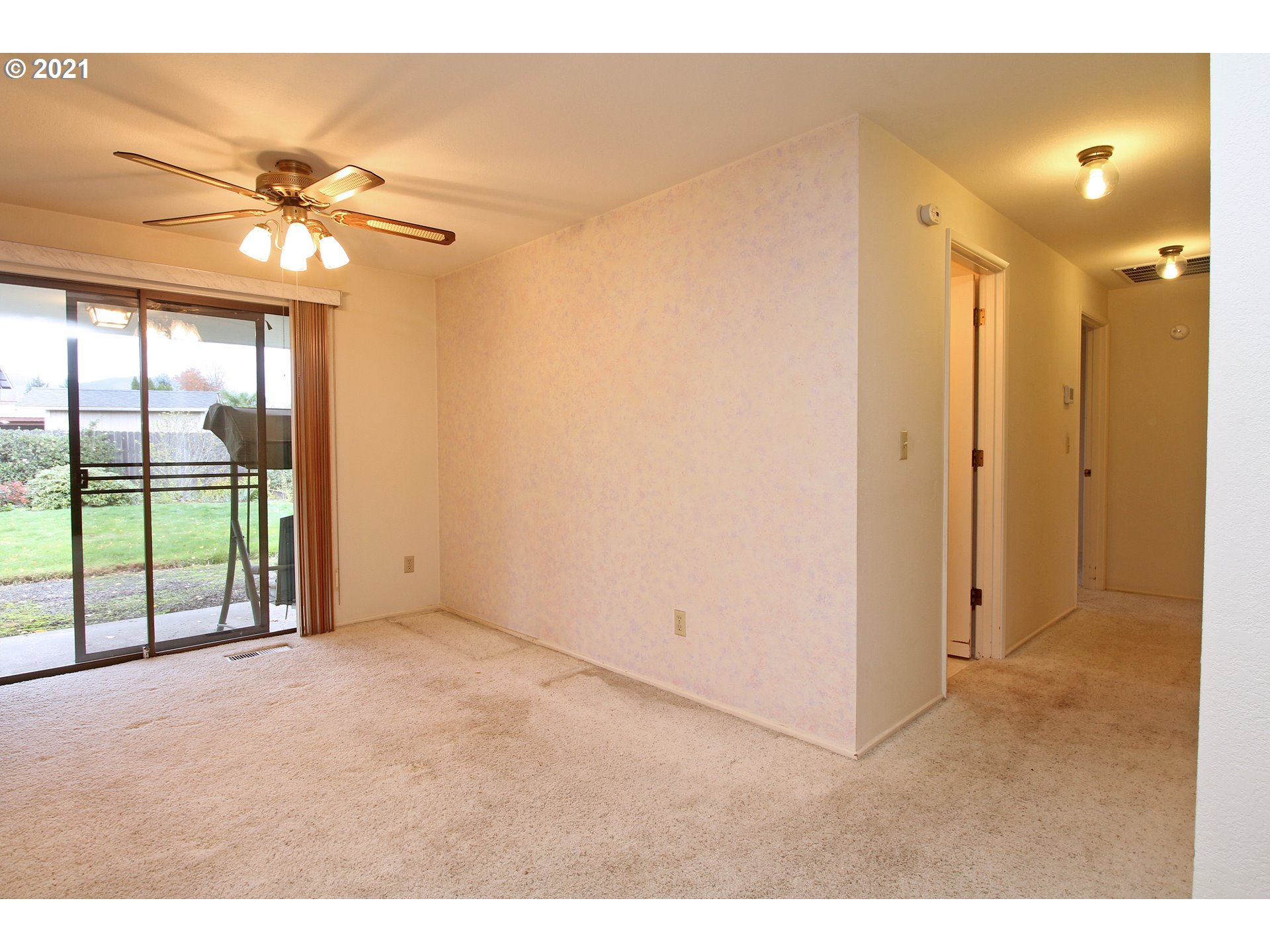 6988 B Street Springfield, OR 97478 - Photo 7 of 31 a view of an empty room with a window
