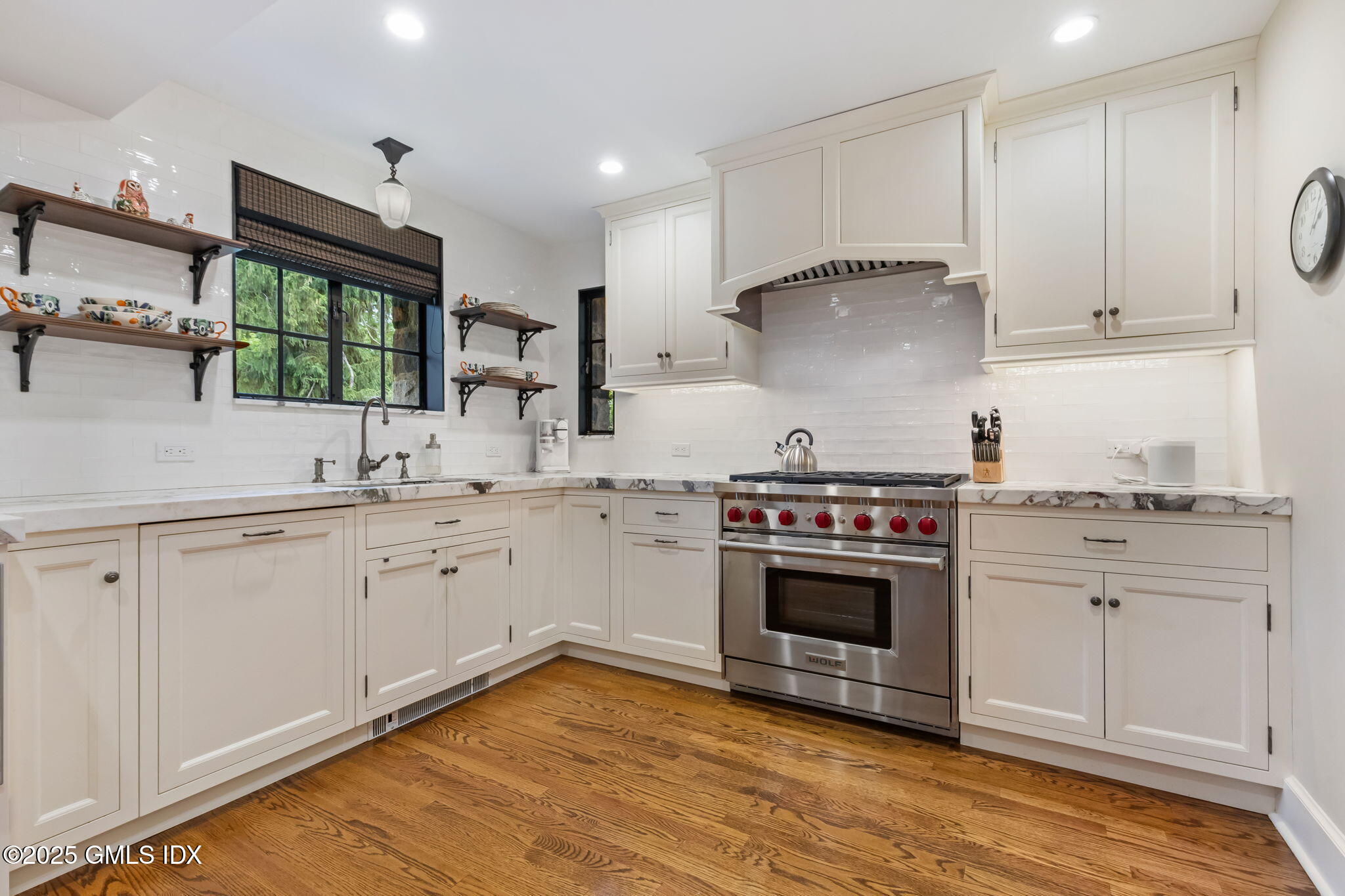 90 Brookside Drive Greenwich, CT 06831 - Photo 13 of 39 a kitchen with cabinets appliances and a window
