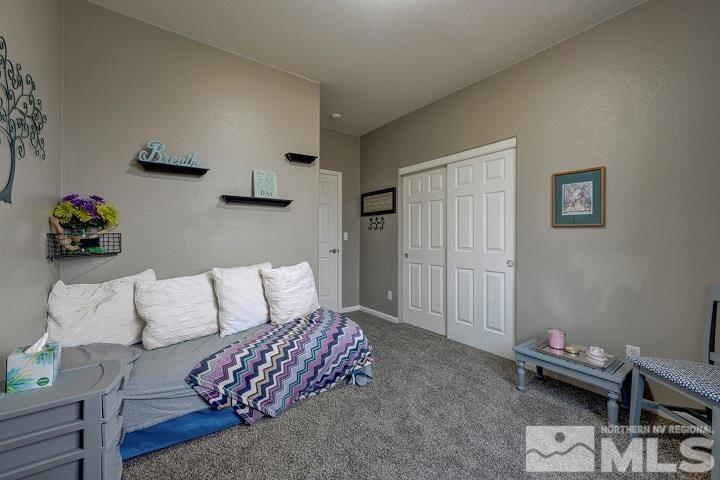 10520 Baton Court Reno, NV 89521 - Photo 26 of 38 a living room with furniture and a couch