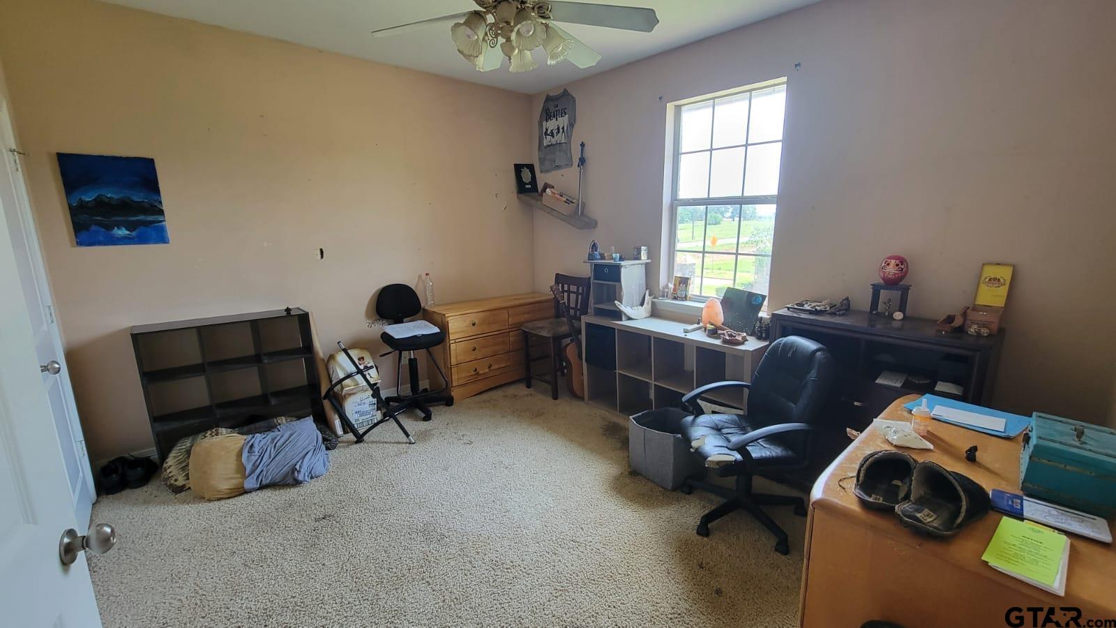 100 Thames Drive Bullard, TX 75757 - Photo 18 of 32 a view of a workspace with furniture and a window
