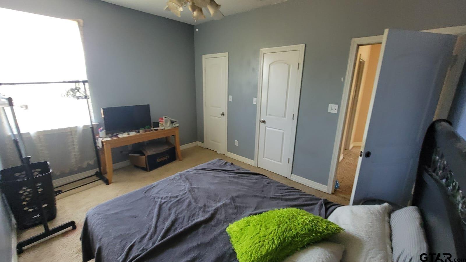 100 Thames Drive Bullard, TX 75757 - Photo 25 of 32 a living room with furniture and a flat screen tv