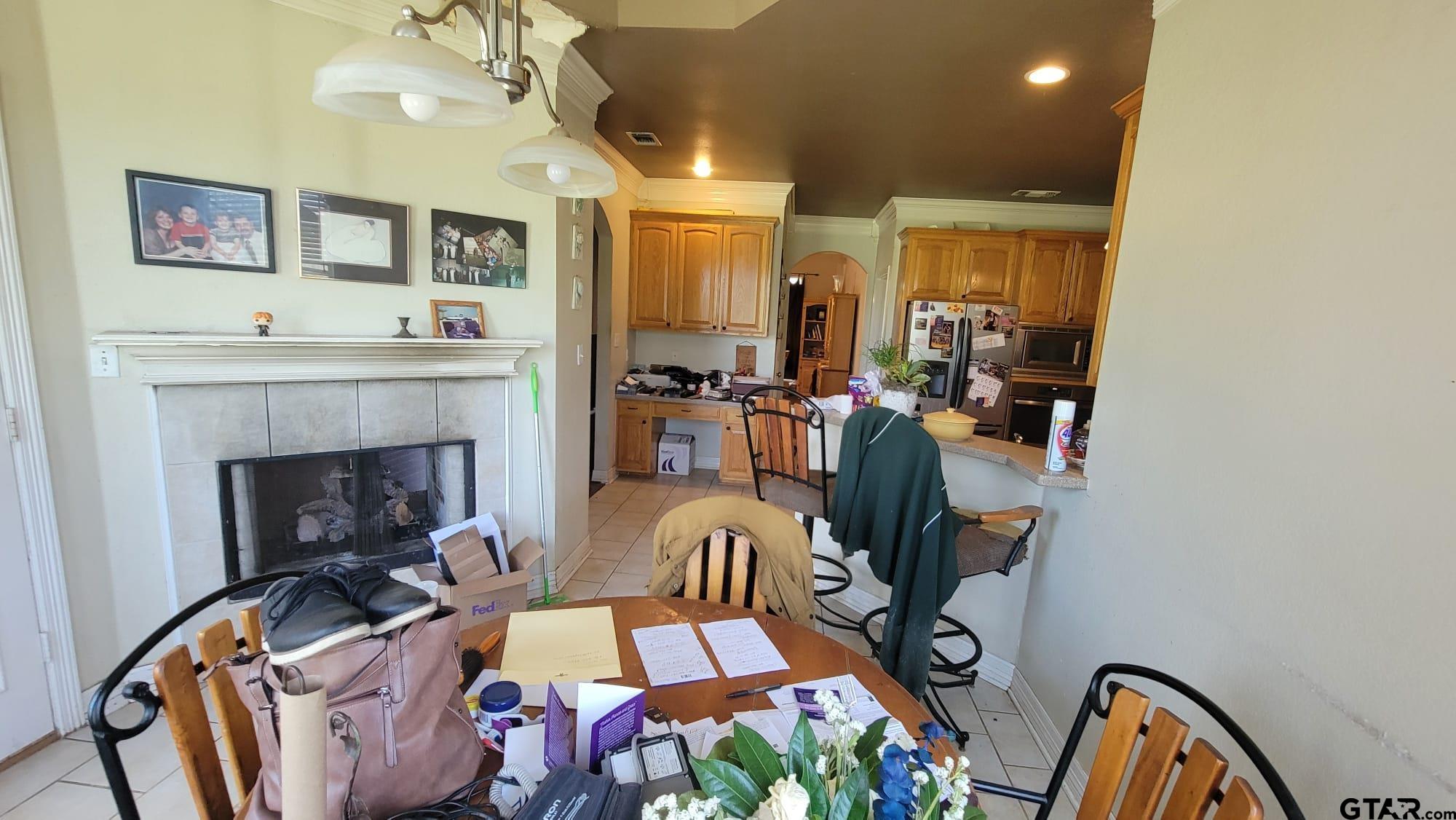 100 Thames Drive Bullard, TX 75757 - Photo 28 of 32 a living room with furniture and a fireplace