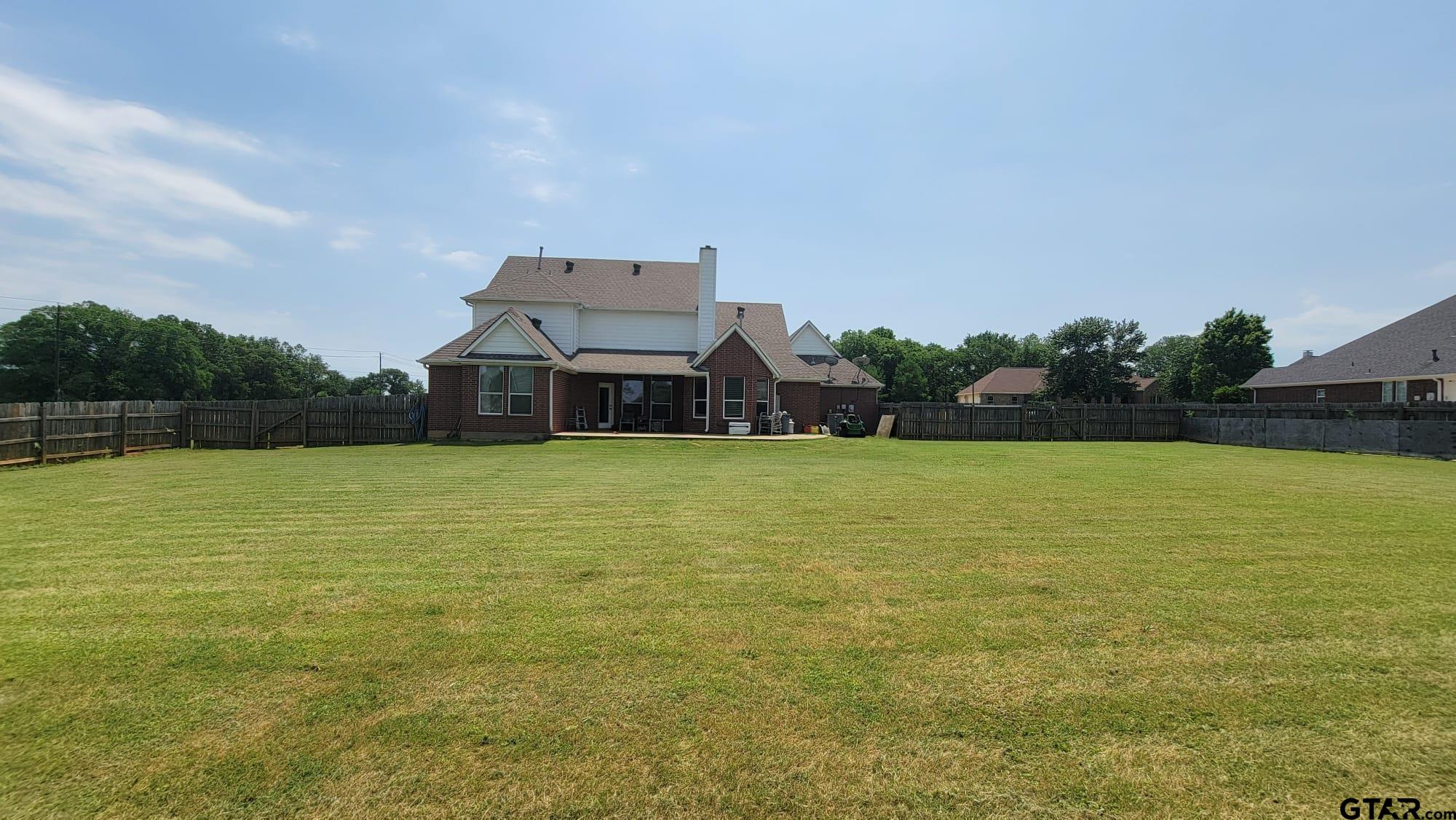 100 Thames Drive Bullard, TX 75757 - Photo 30 of 32 a front view of a house with a garden