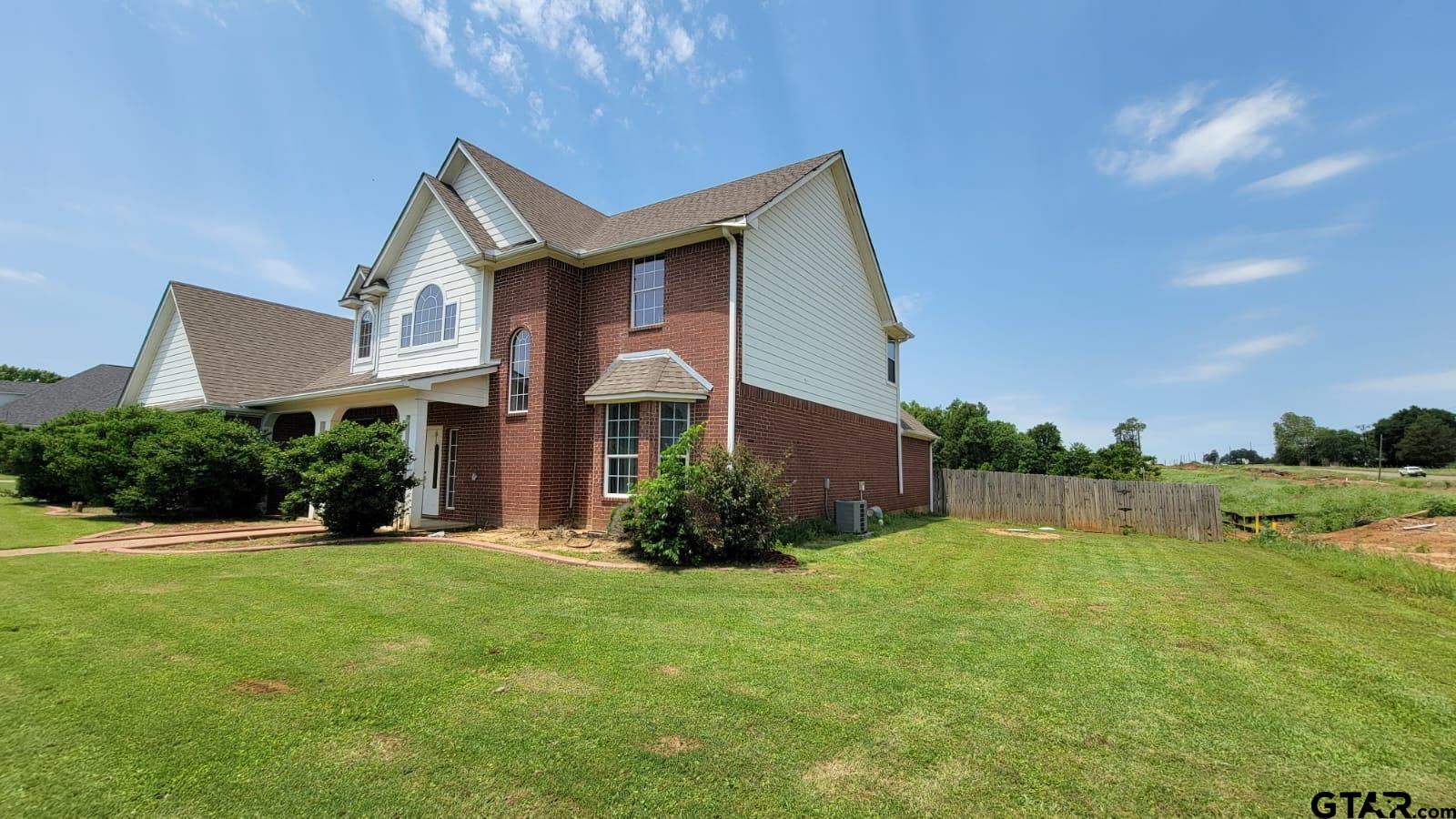 100 Thames Drive Bullard, TX 75757 - Photo 3 of 32 a front view of a house with a yard